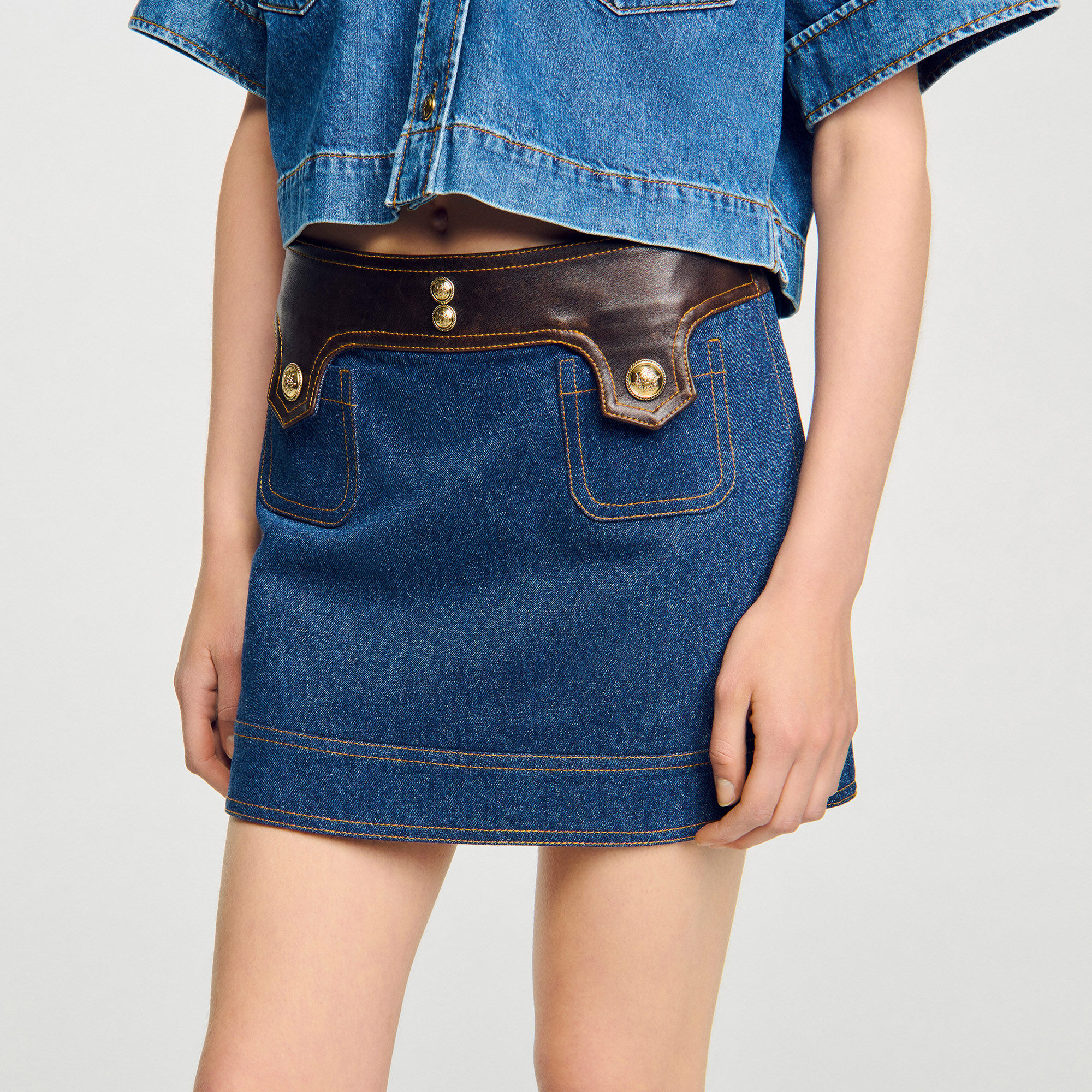 Korte rok denim en leer