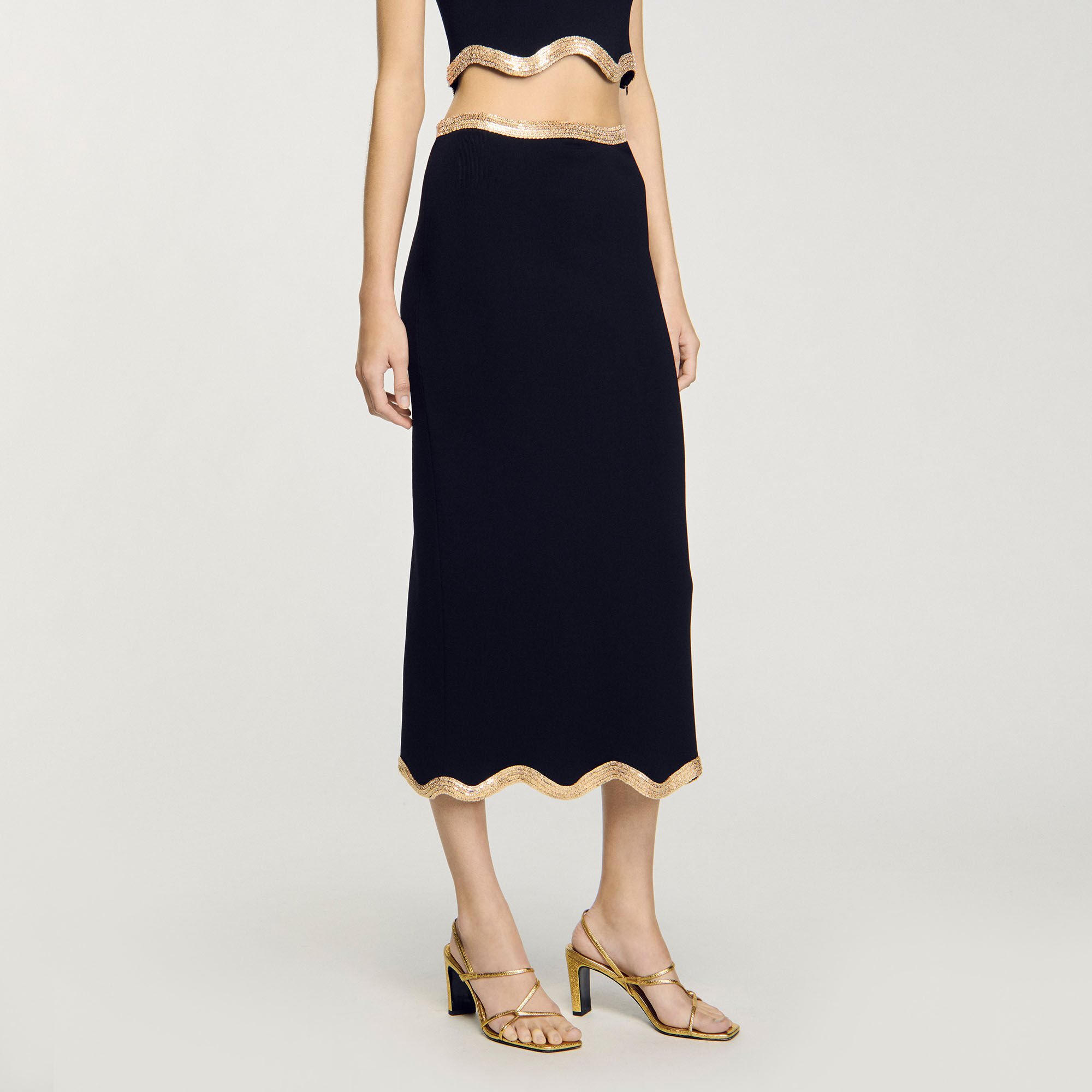 Lange rok tricot ketting details