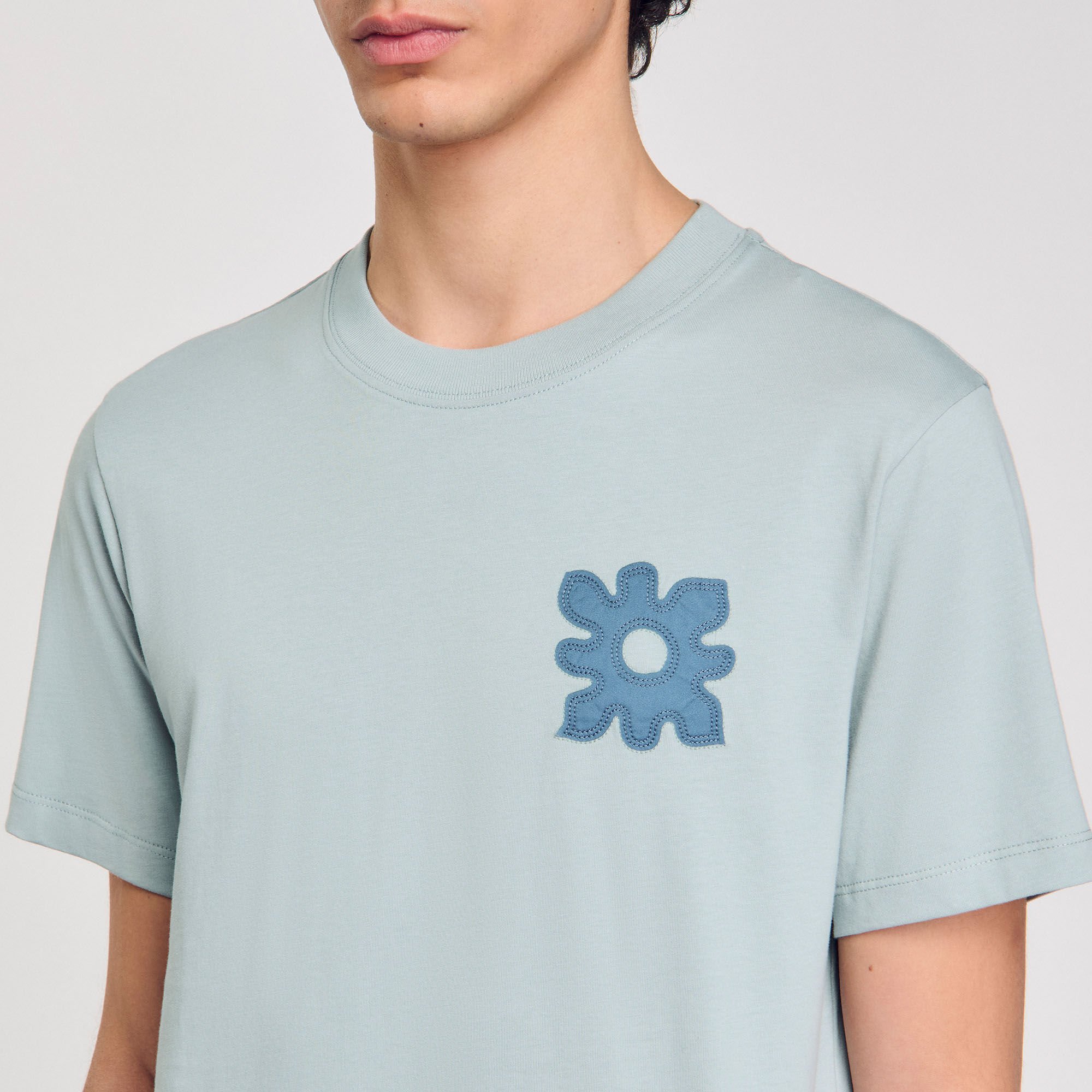 T-shirt met detail bloem