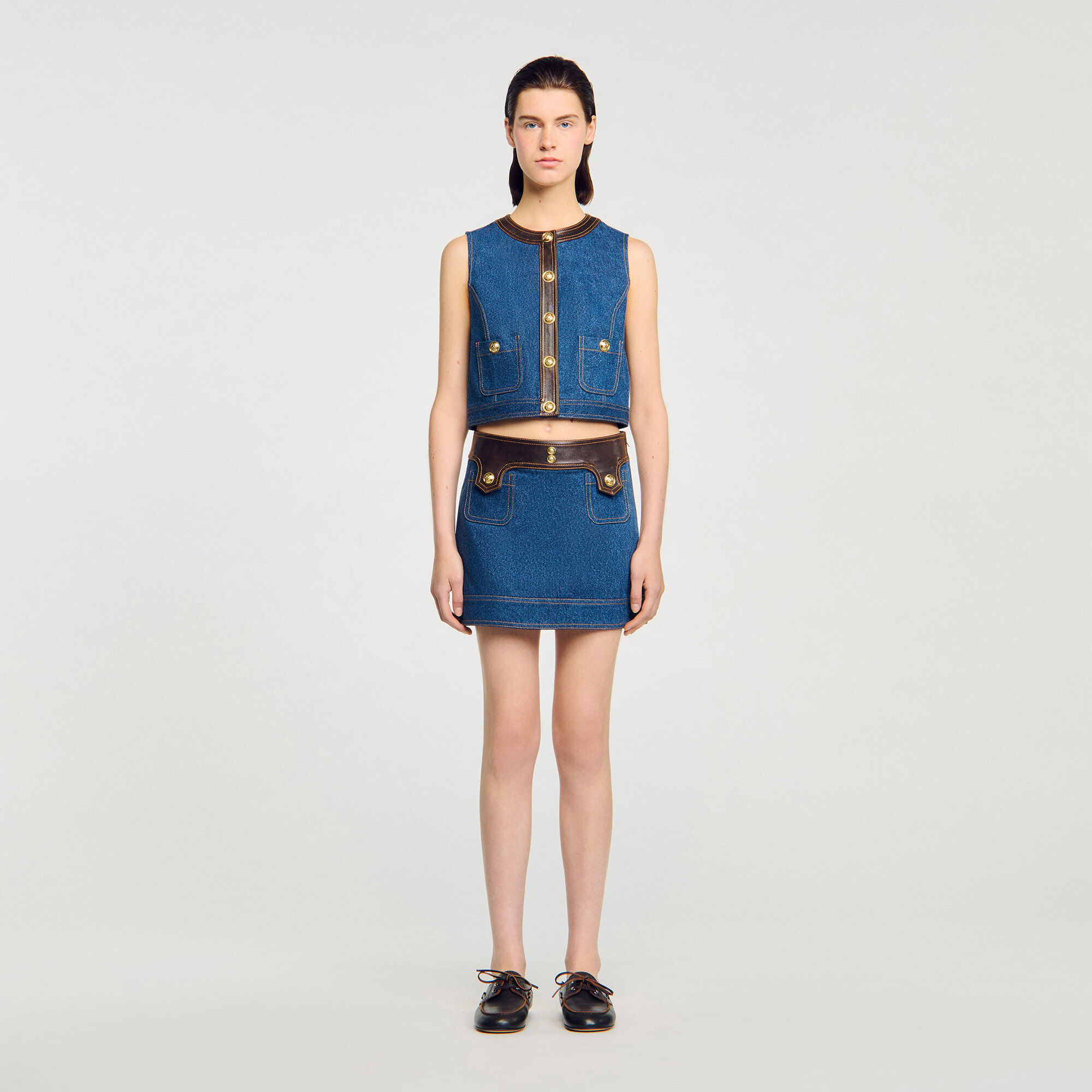 Top van denim en leer