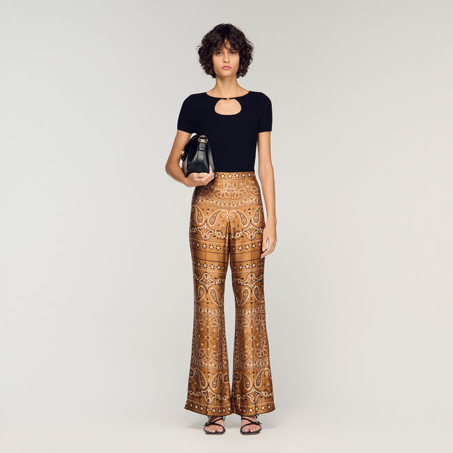 Trui met opengewerkte kraag