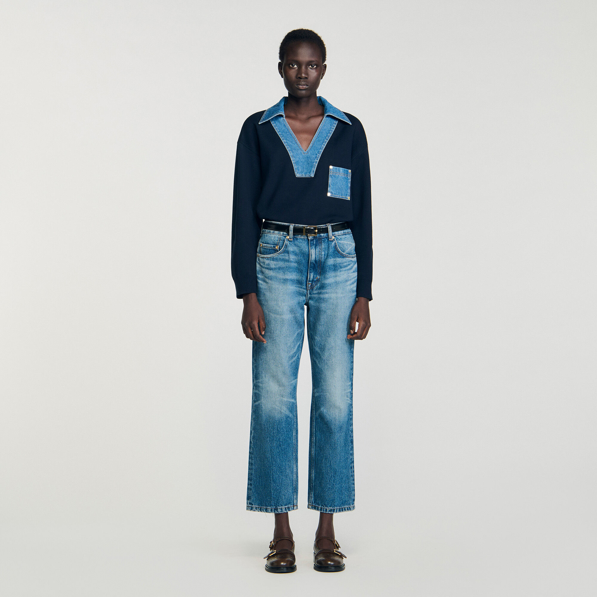 Trui met denimdetails