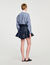 Korte denim rok met volants