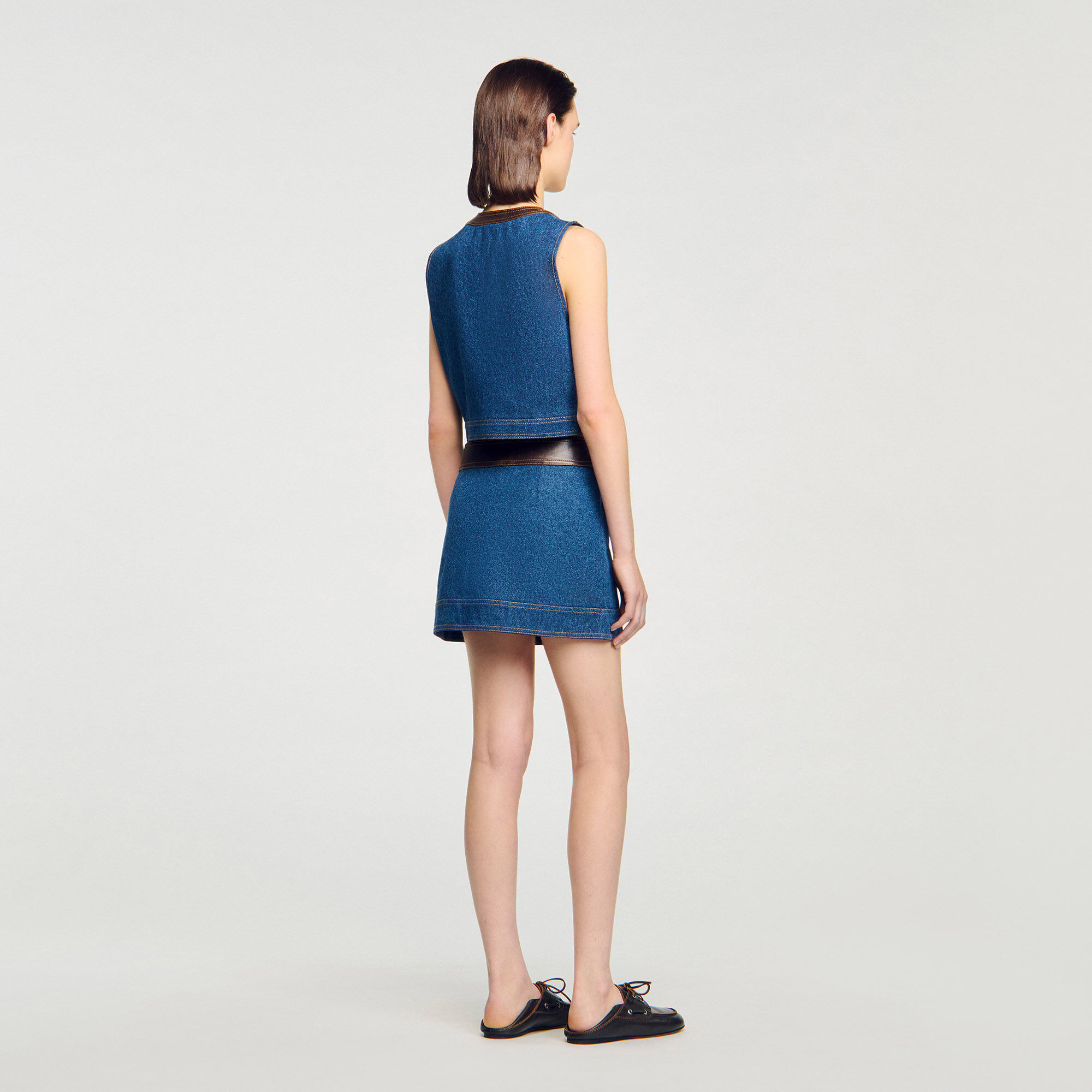 Top van denim en leer