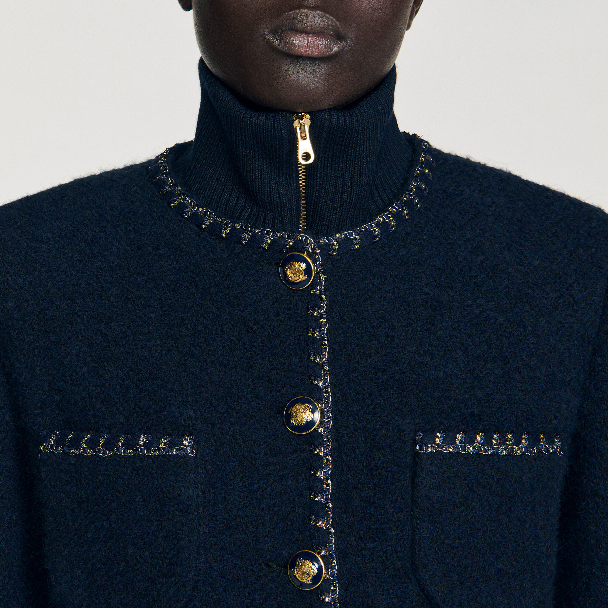 Tweed jasje met siergalons