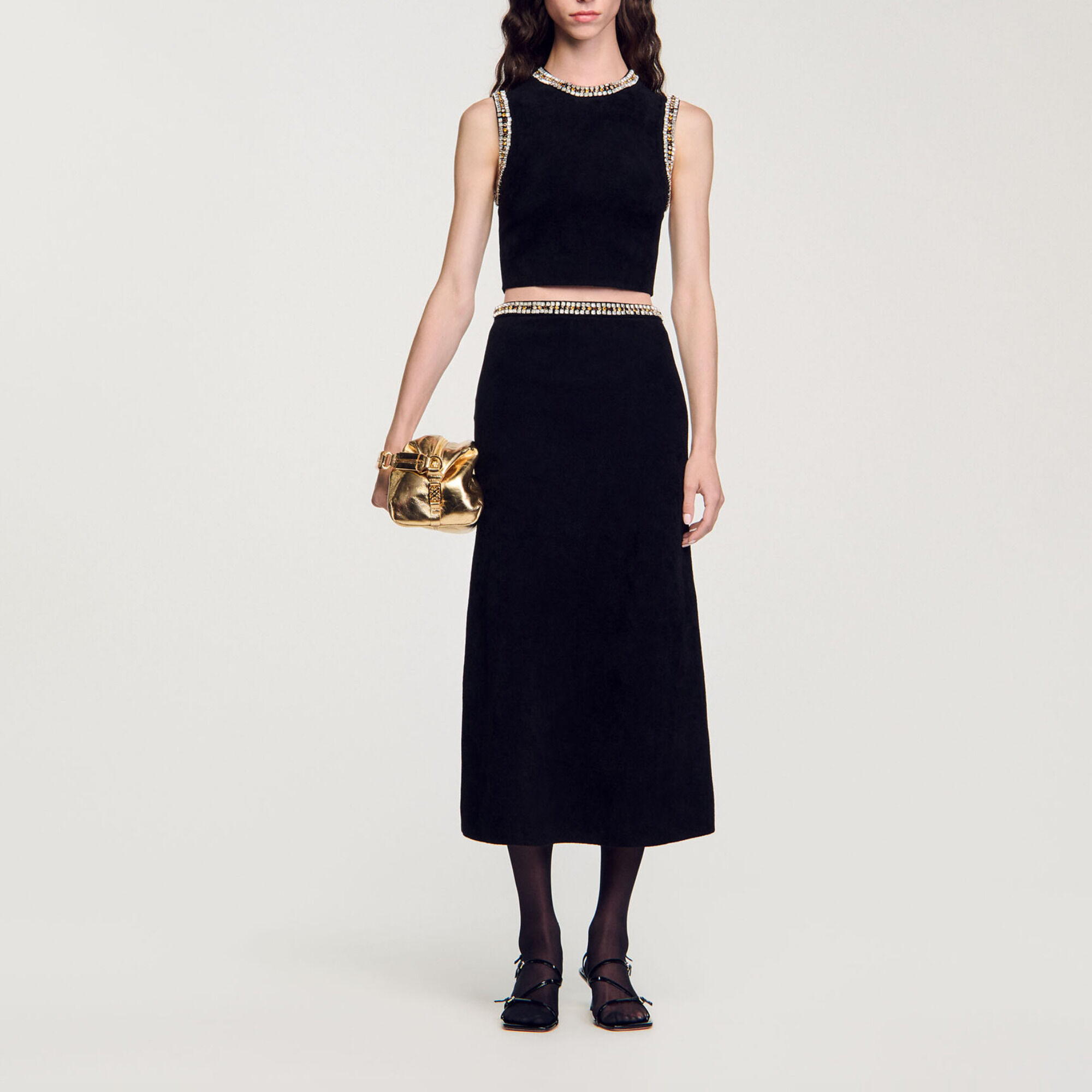 Top gebreid hals met sieraden