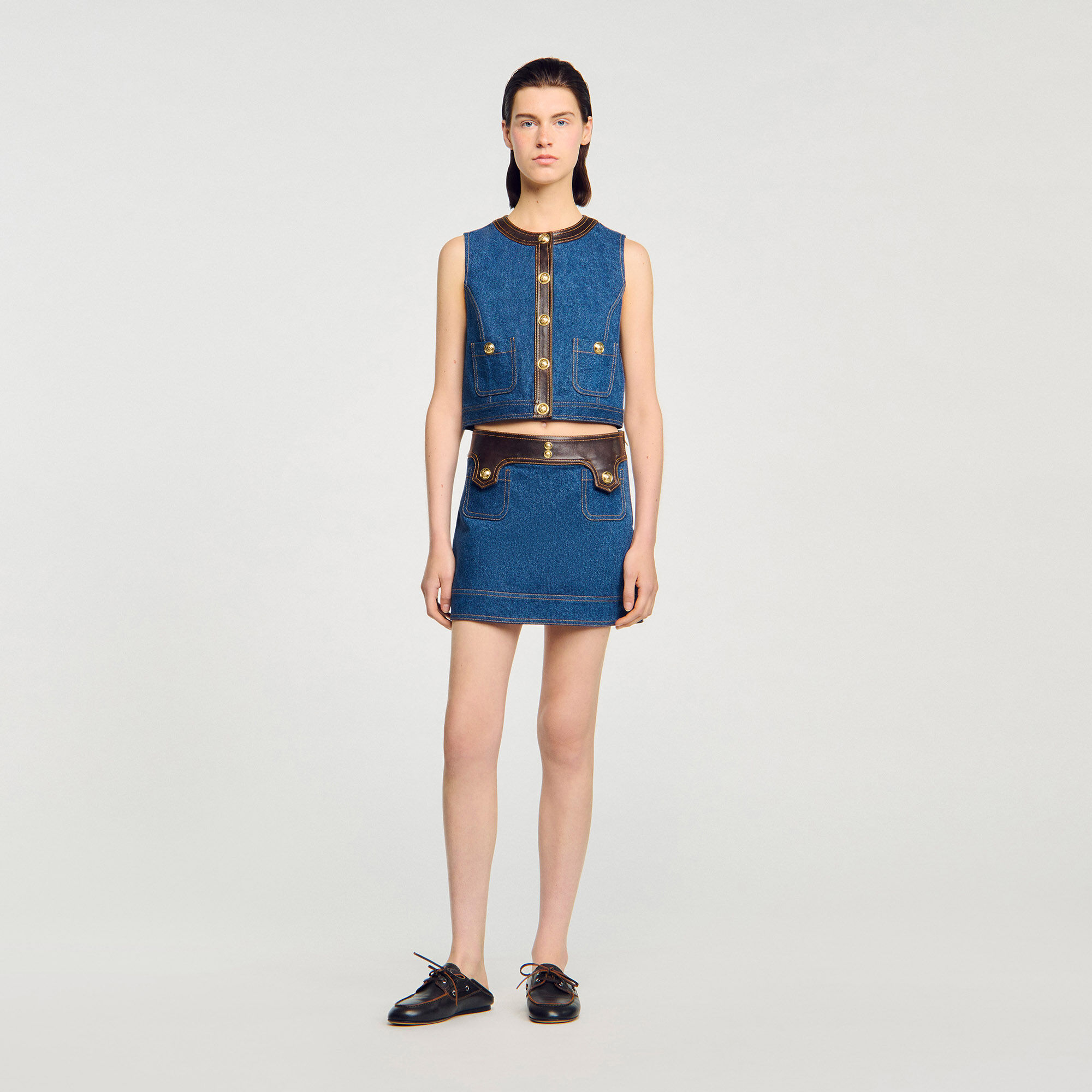 Top van denim en leer