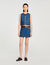 Top van denim en leer