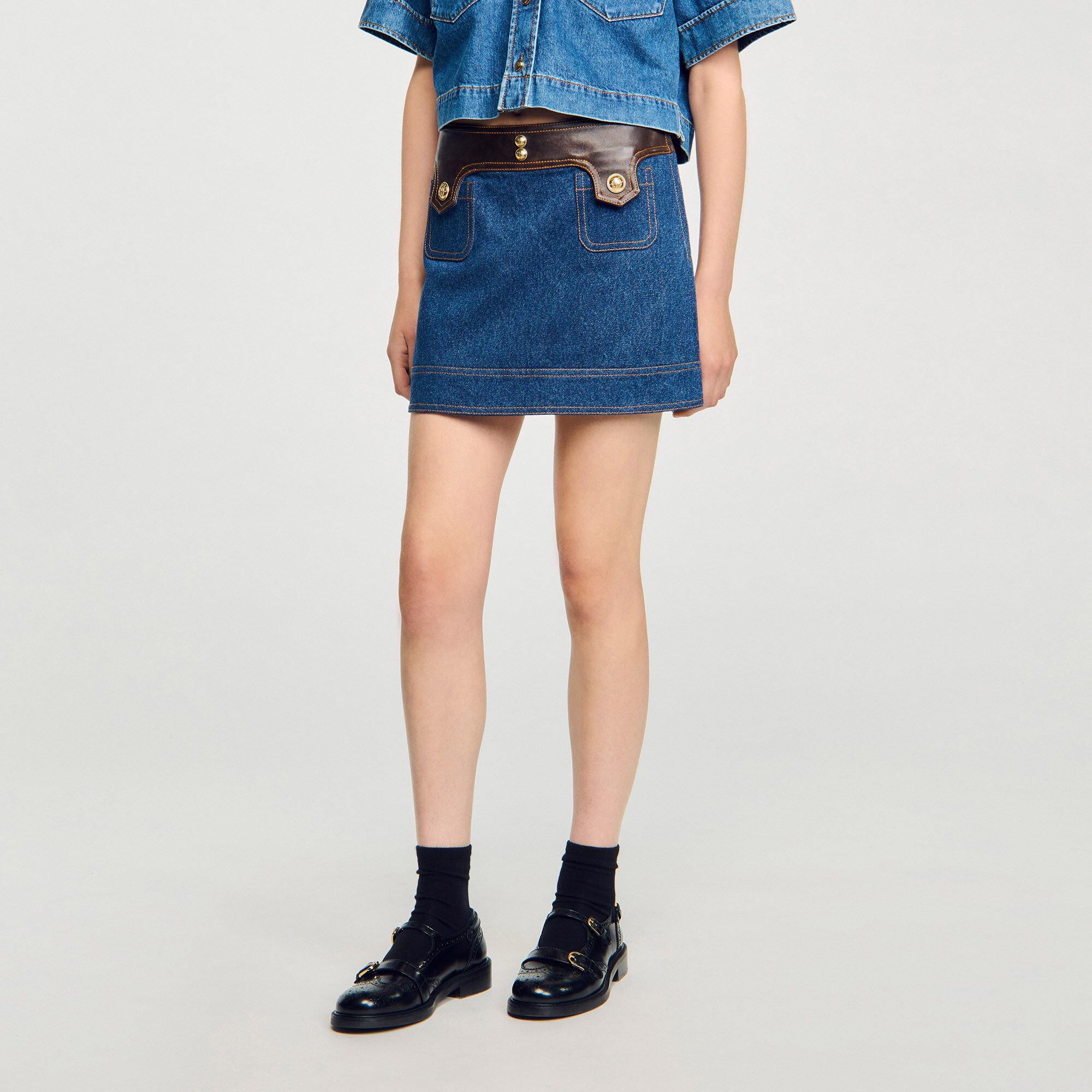 Korte rok denim en leer