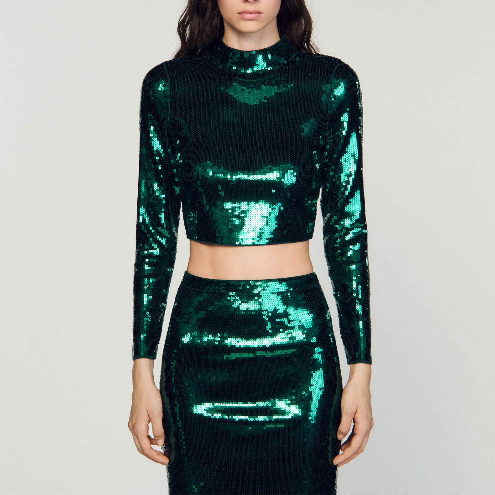 Korte tricot trui met lovertjes