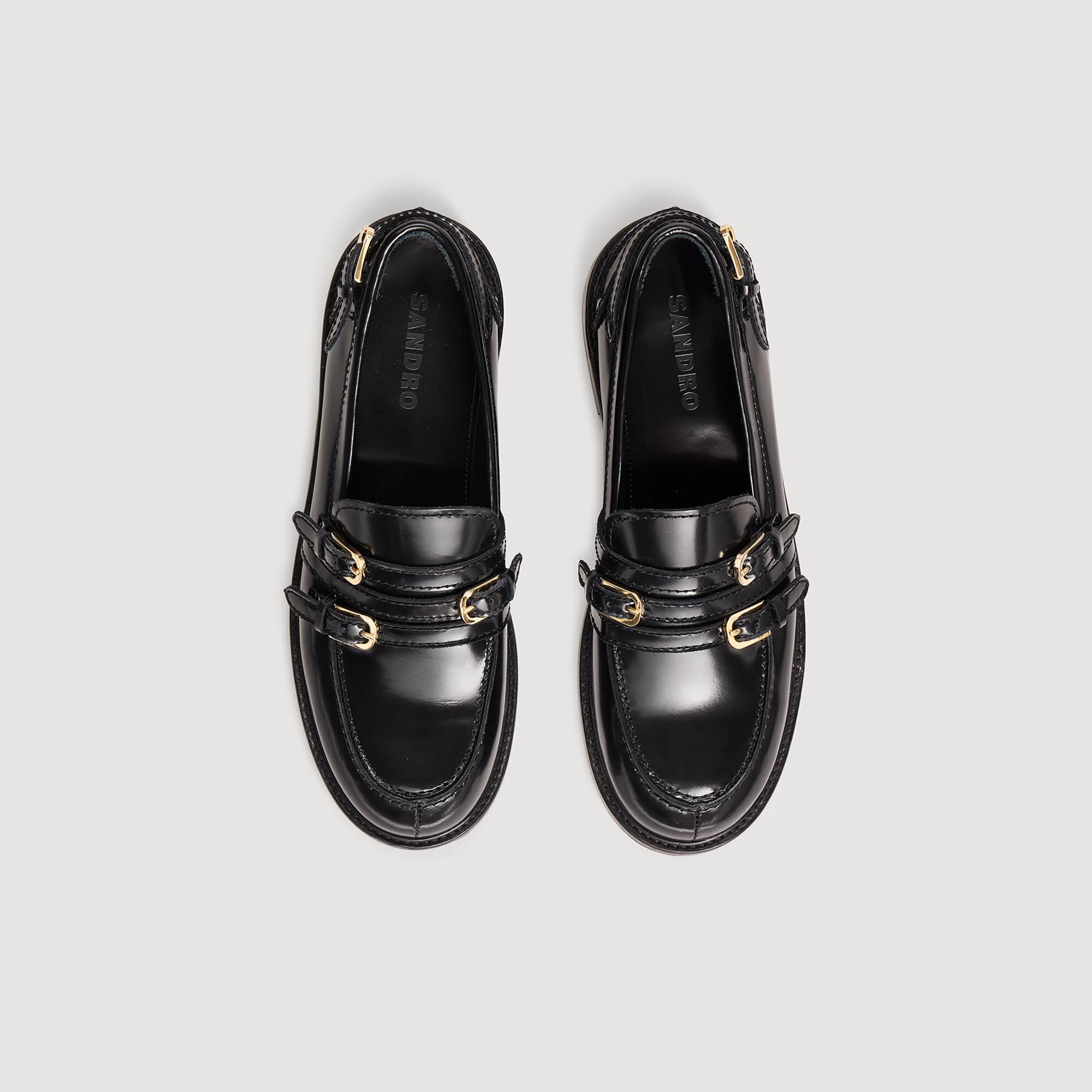 Loafers leer met gespen