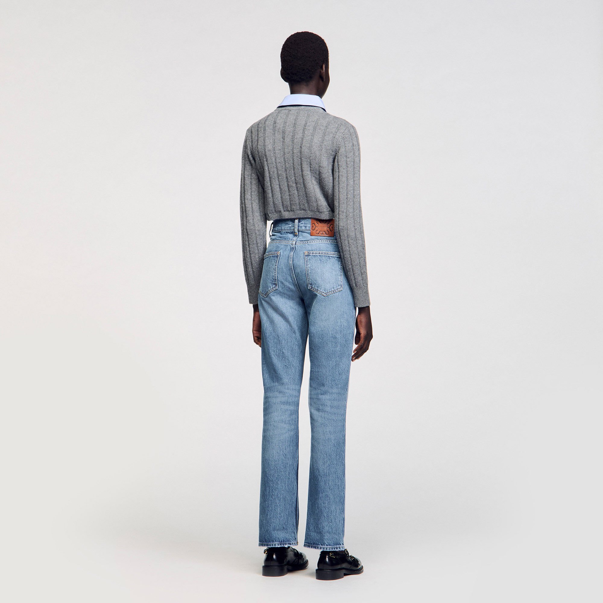 Verbleekte wijd uitlopende jeans