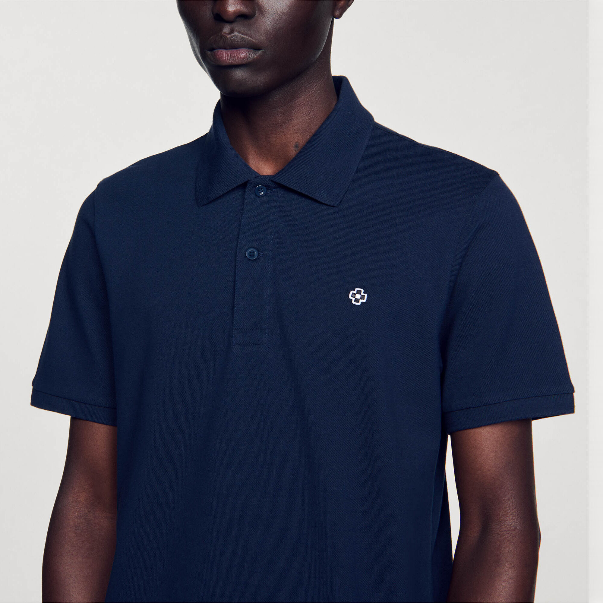 Polo met square cross-patch - Man | Sandro