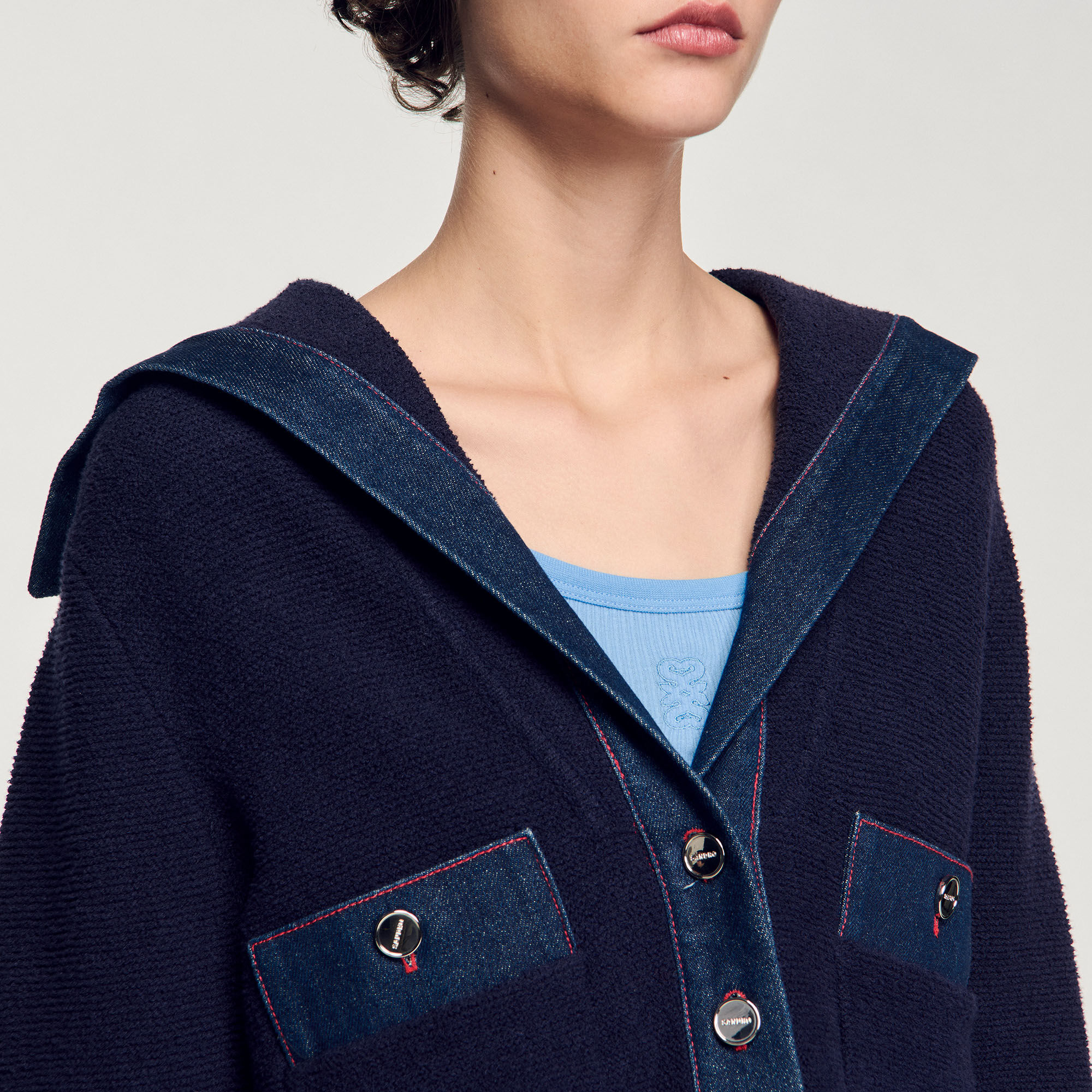 Cardigan vest met denim