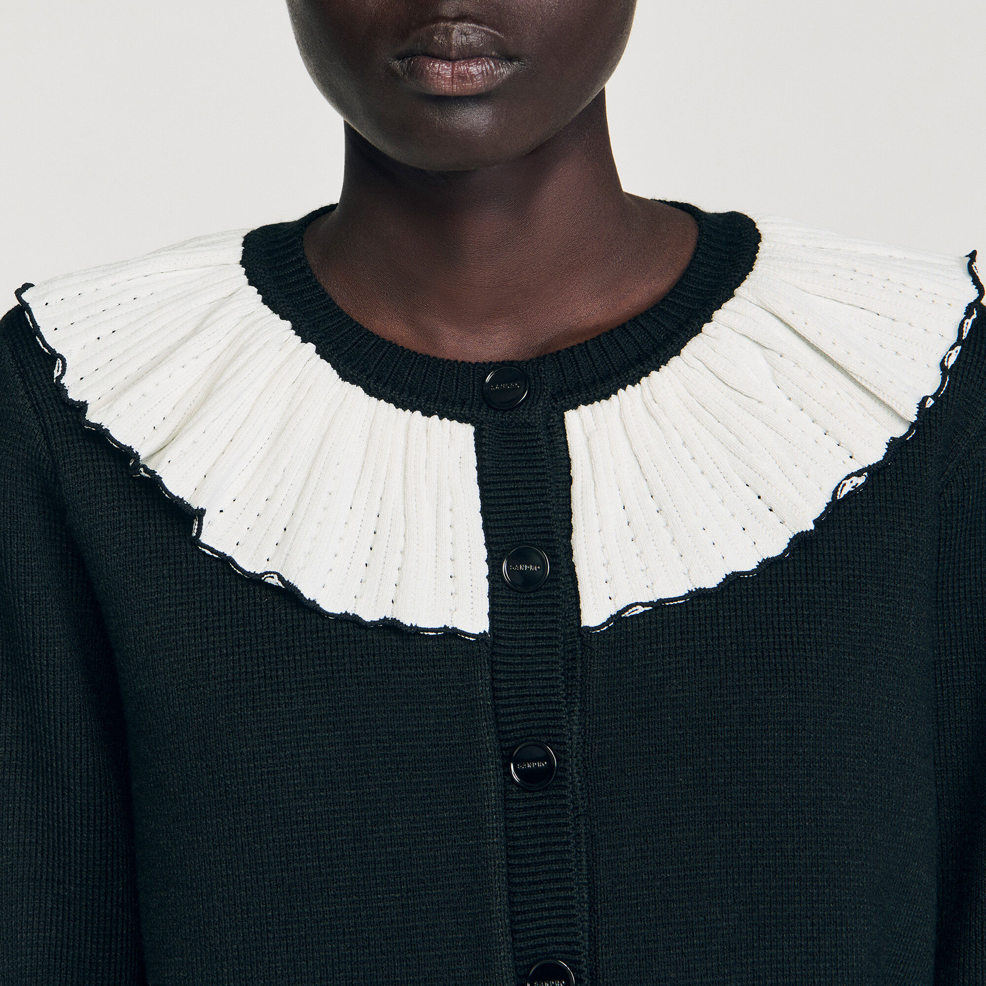 Cardigan vest contrasterende kraag