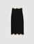 Lange rok tricot ketting details