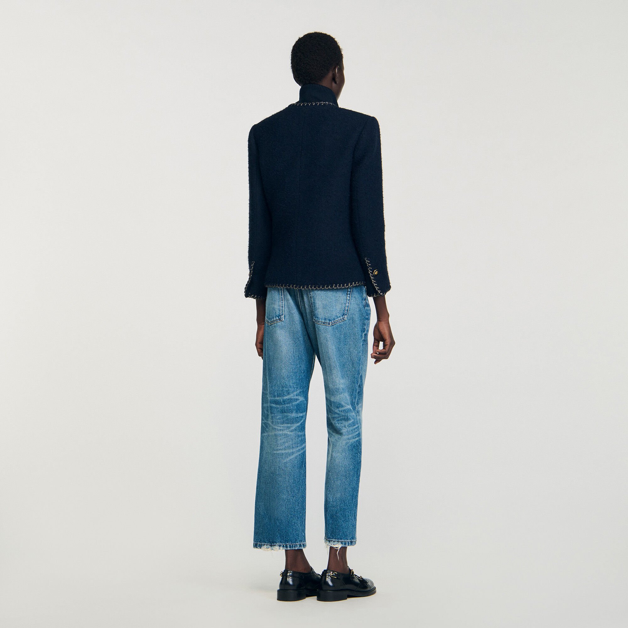 Tweed jasje met siergalons