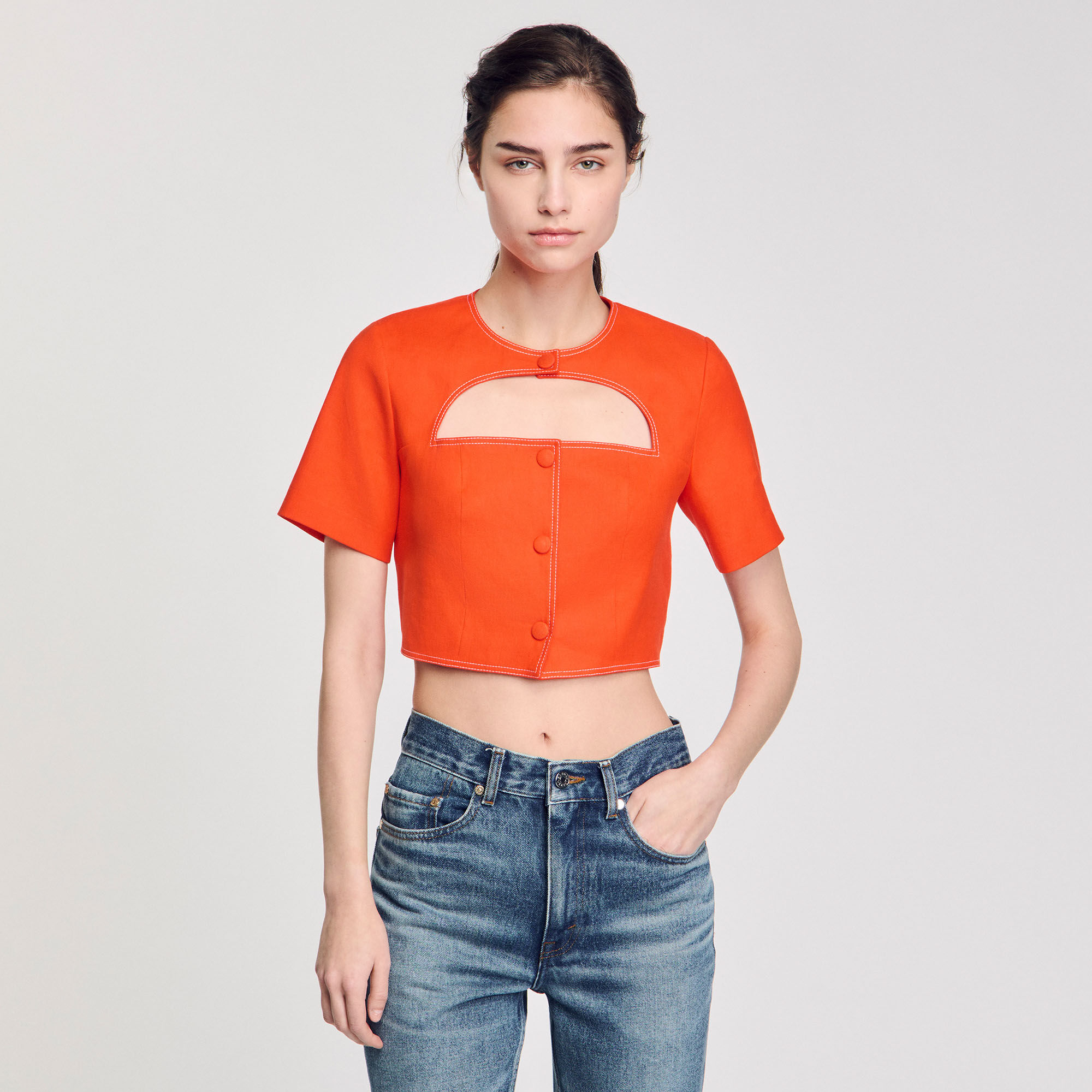 Korte top met opening