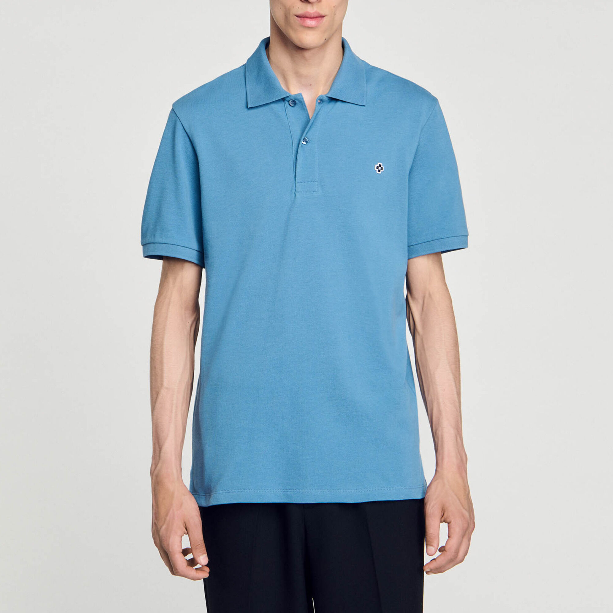 Polo met square cross-patch
