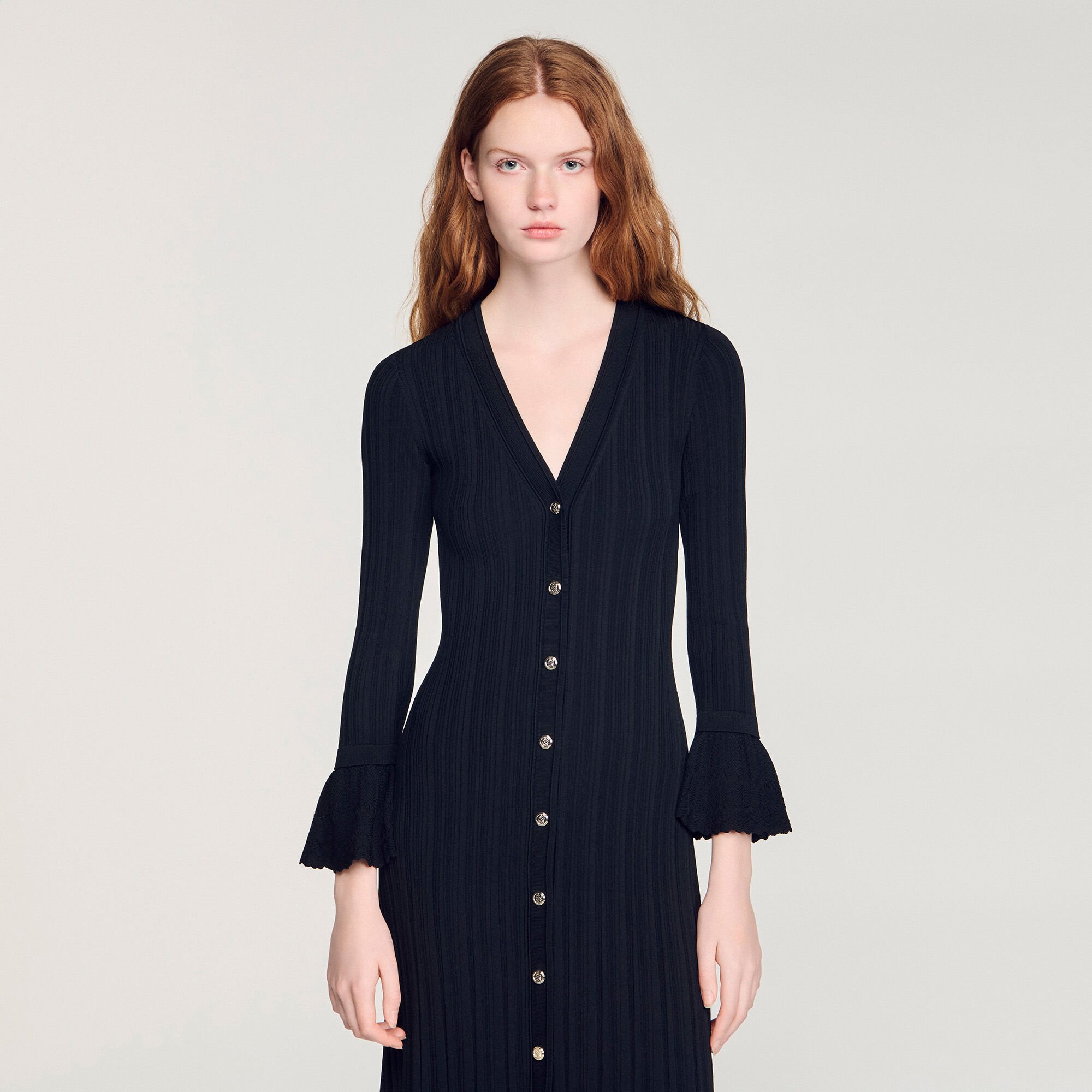 Lange gebreide jurk met volant