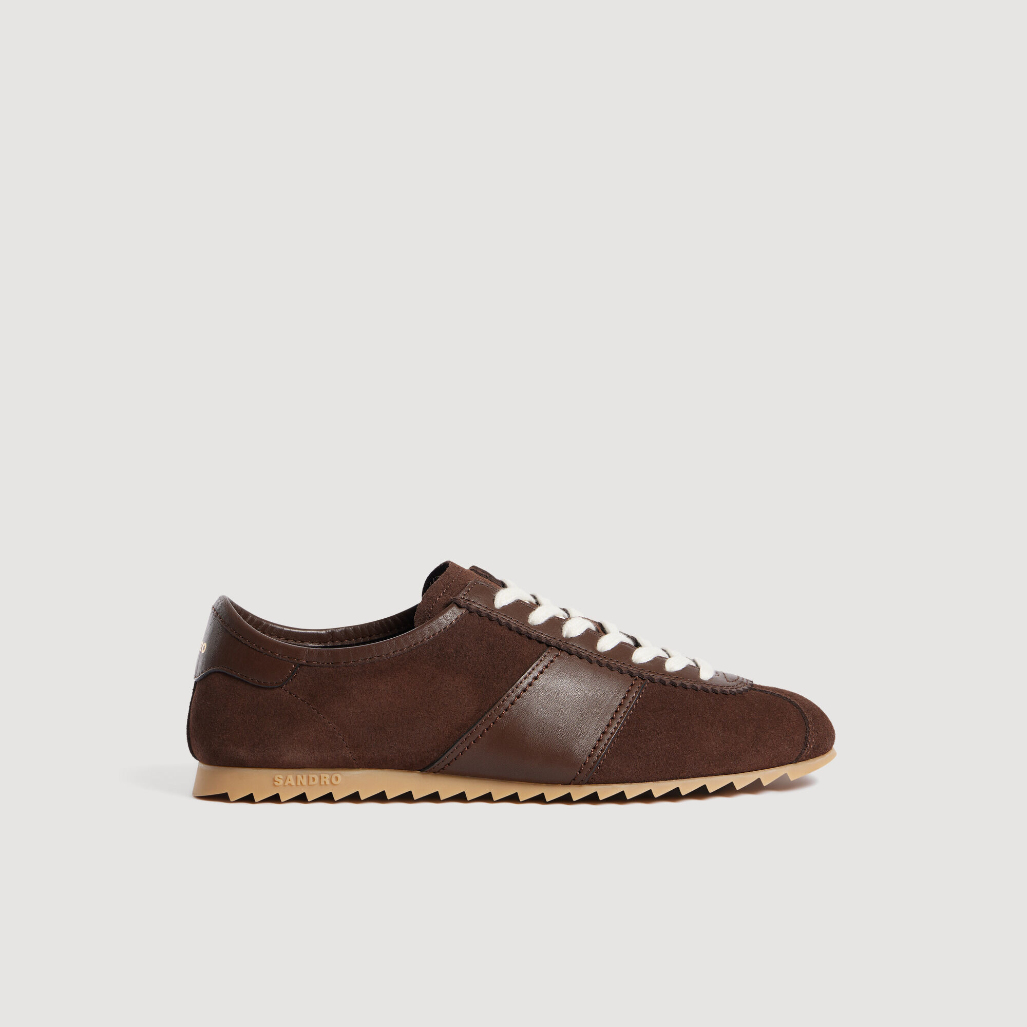 Lage sneakers van leer en su&egrave;de
