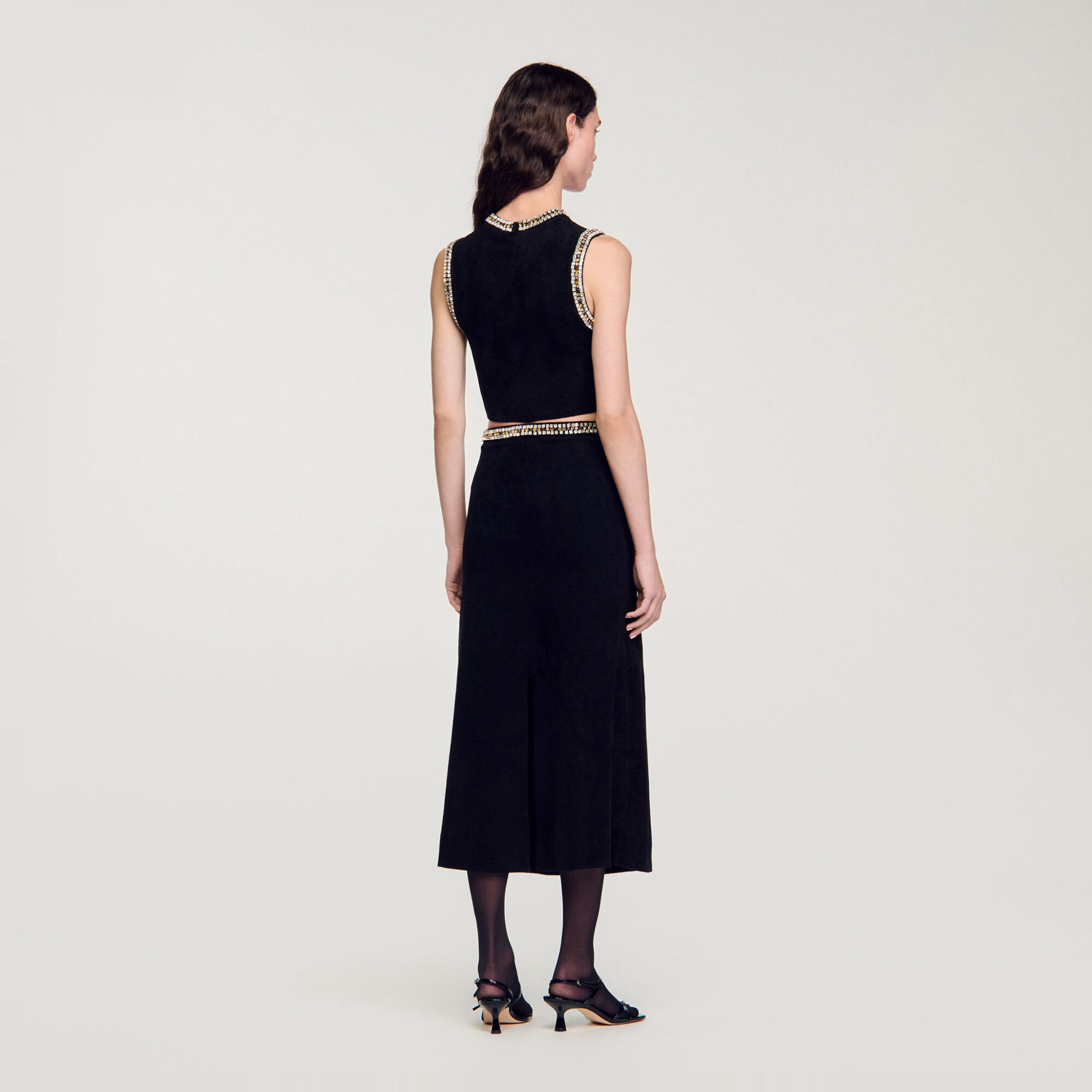 Top gebreid hals met sieraden