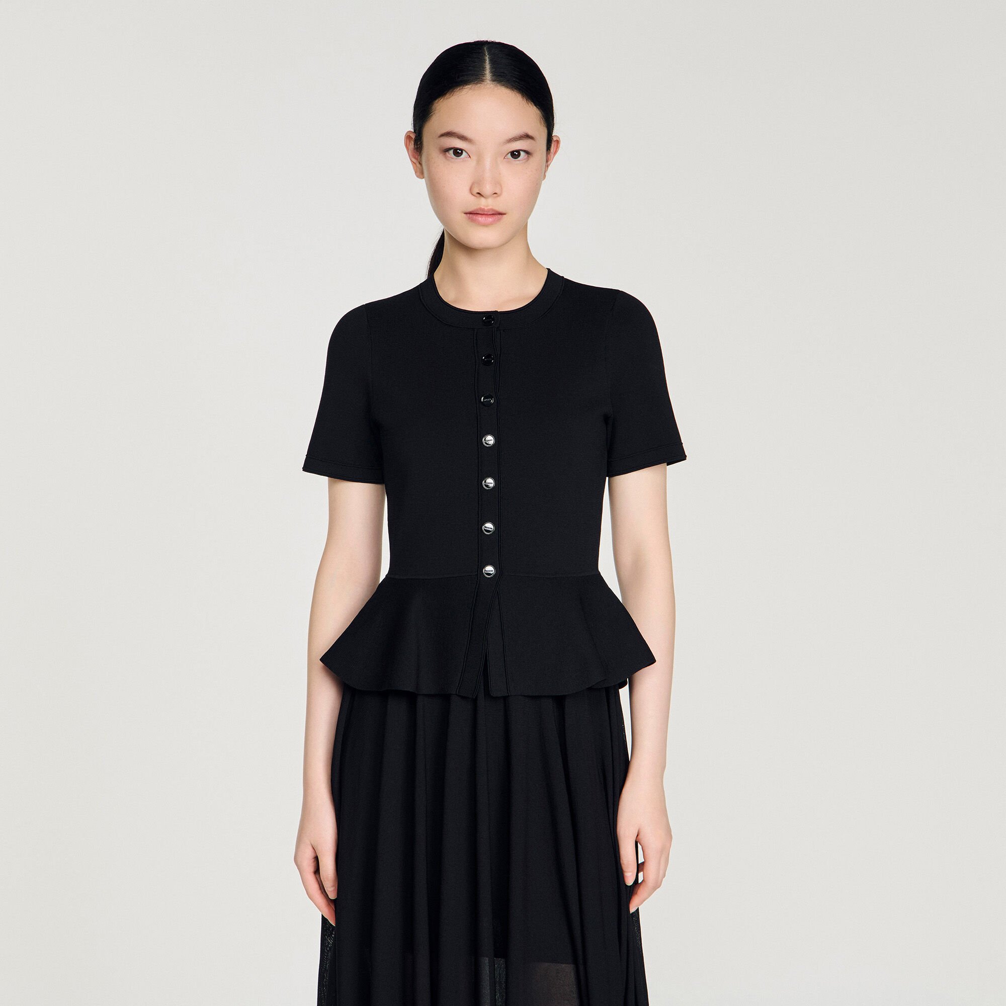 Lange gebreide jurk met peplum