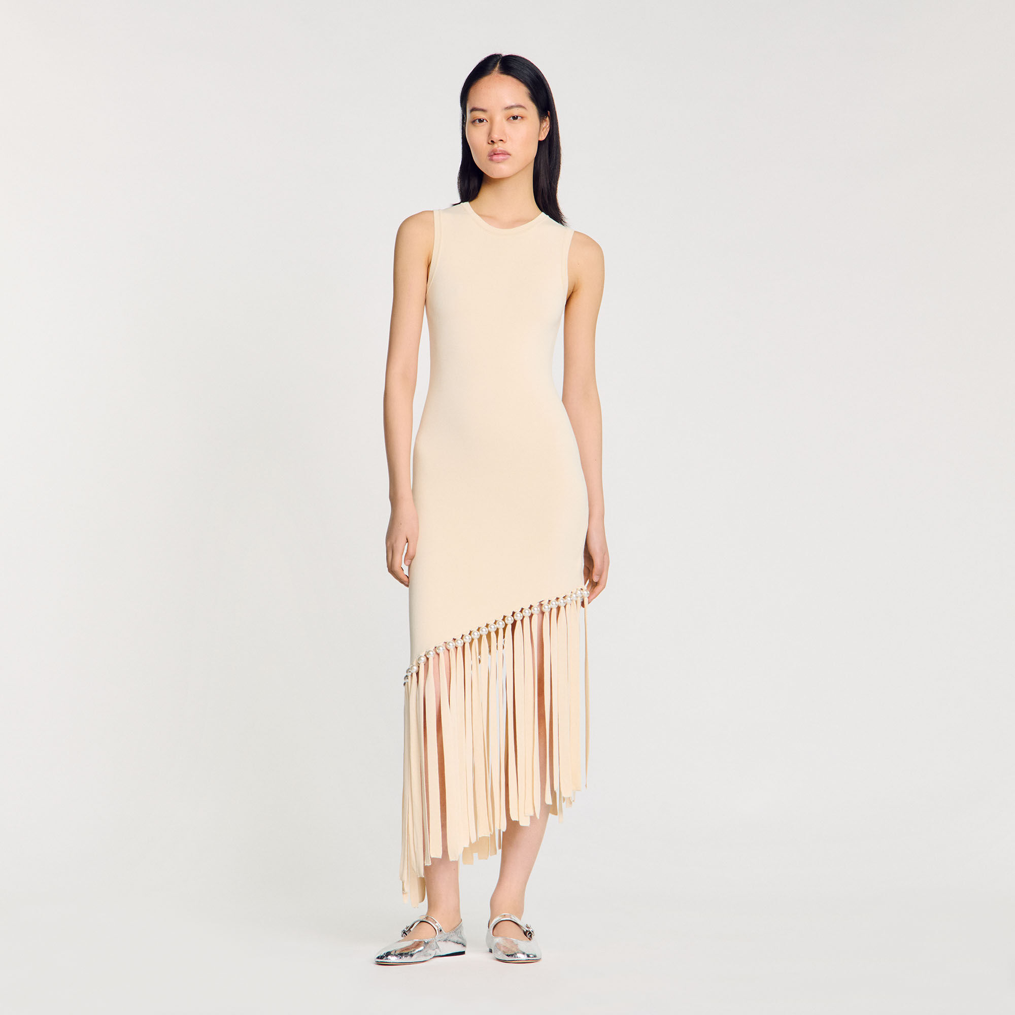 Jurk tricot met franjes en parels
