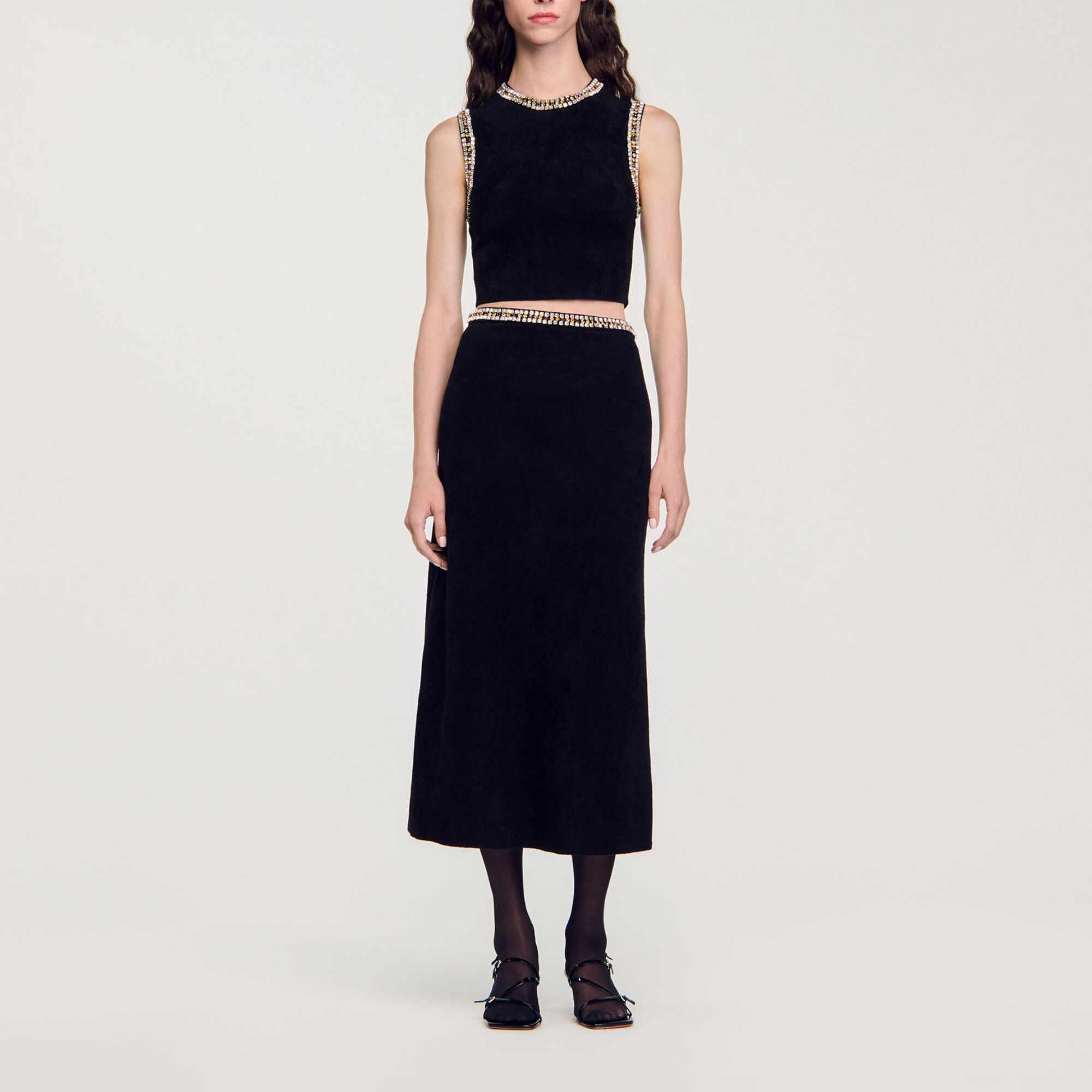 Top gebreid hals met sieraden