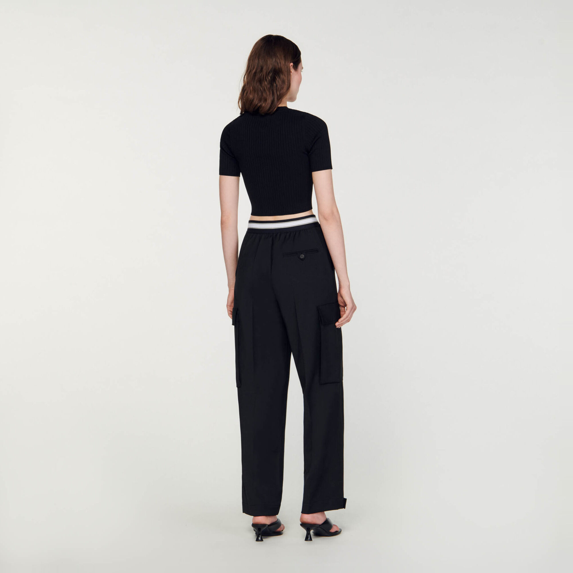 Opengewerkte korte trui