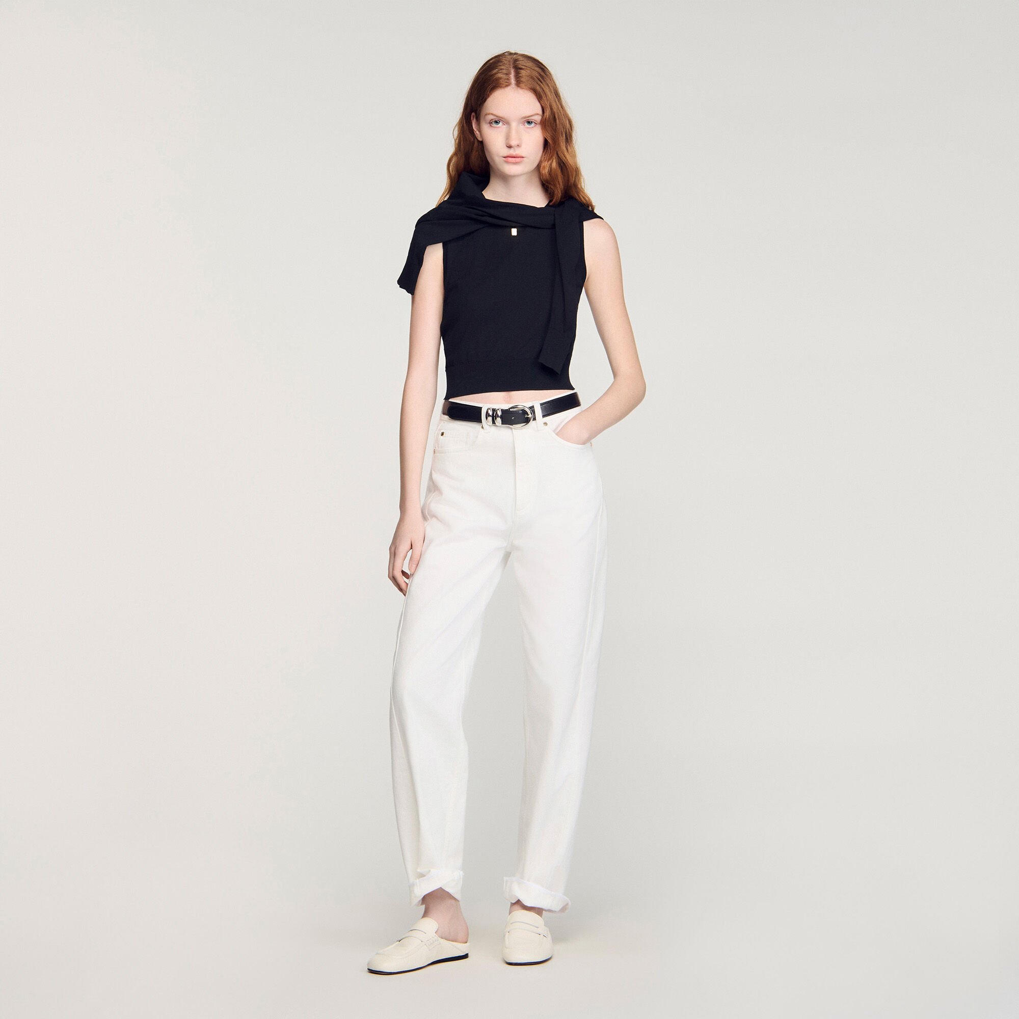 Korte gebreide mouwloze trui