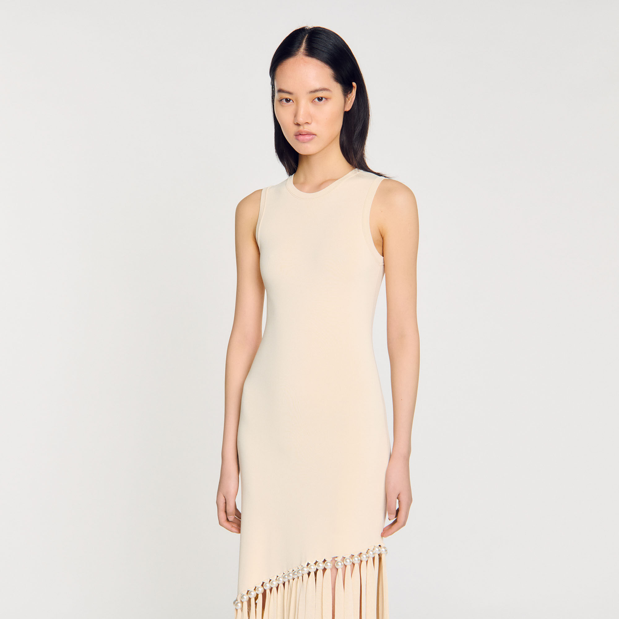 Jurk tricot met franjes en parels