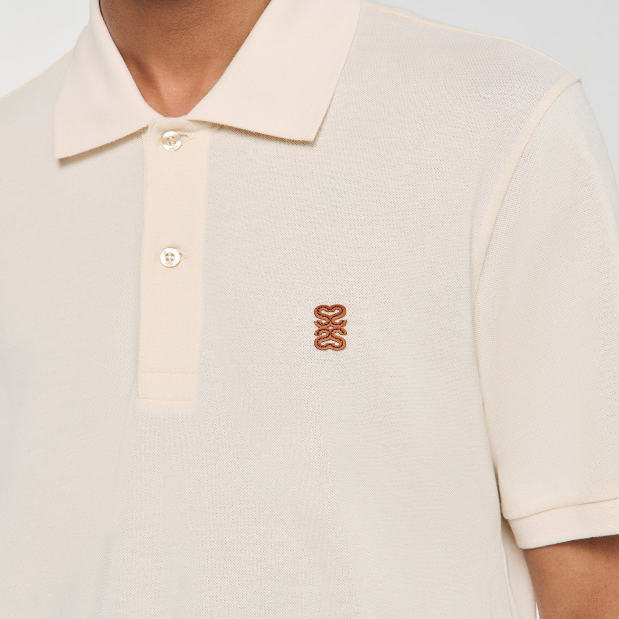 Poloshirt met leren logo