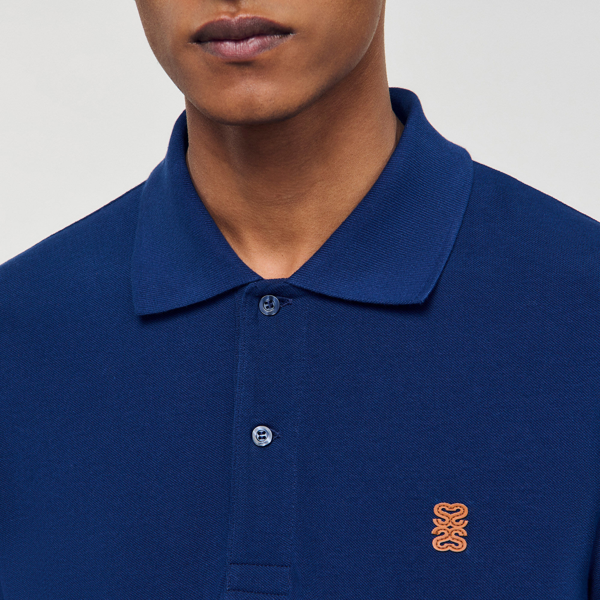 Poloshirt met leren logo