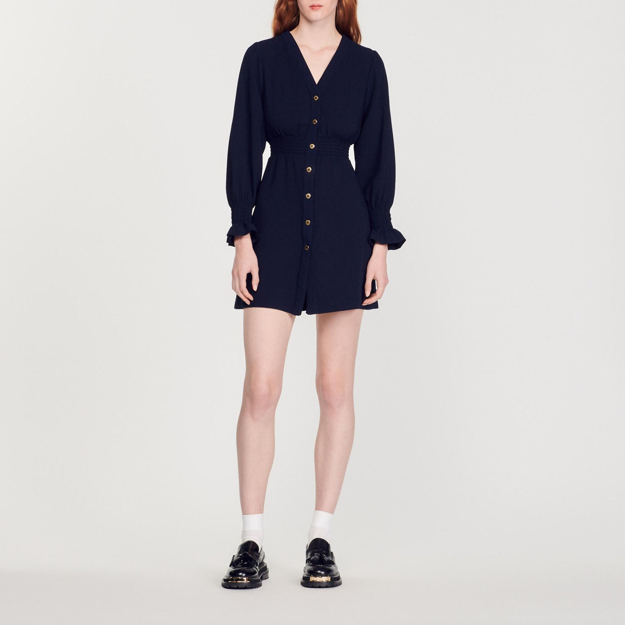 Dress with press studs and smocked belt