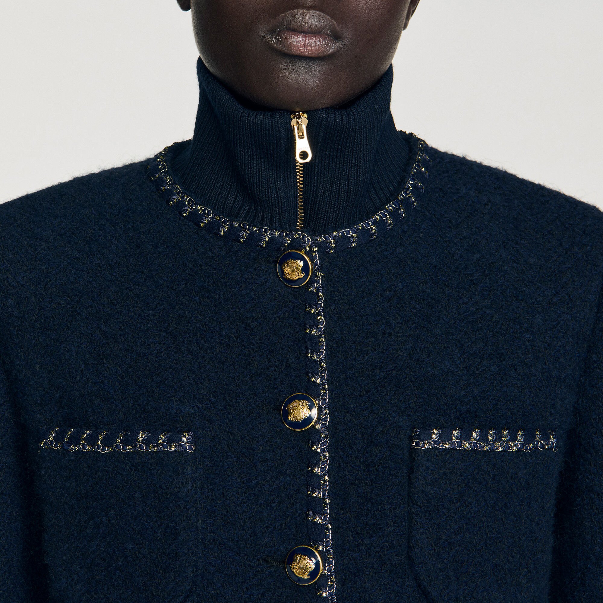 Tweed jasje met siergalons