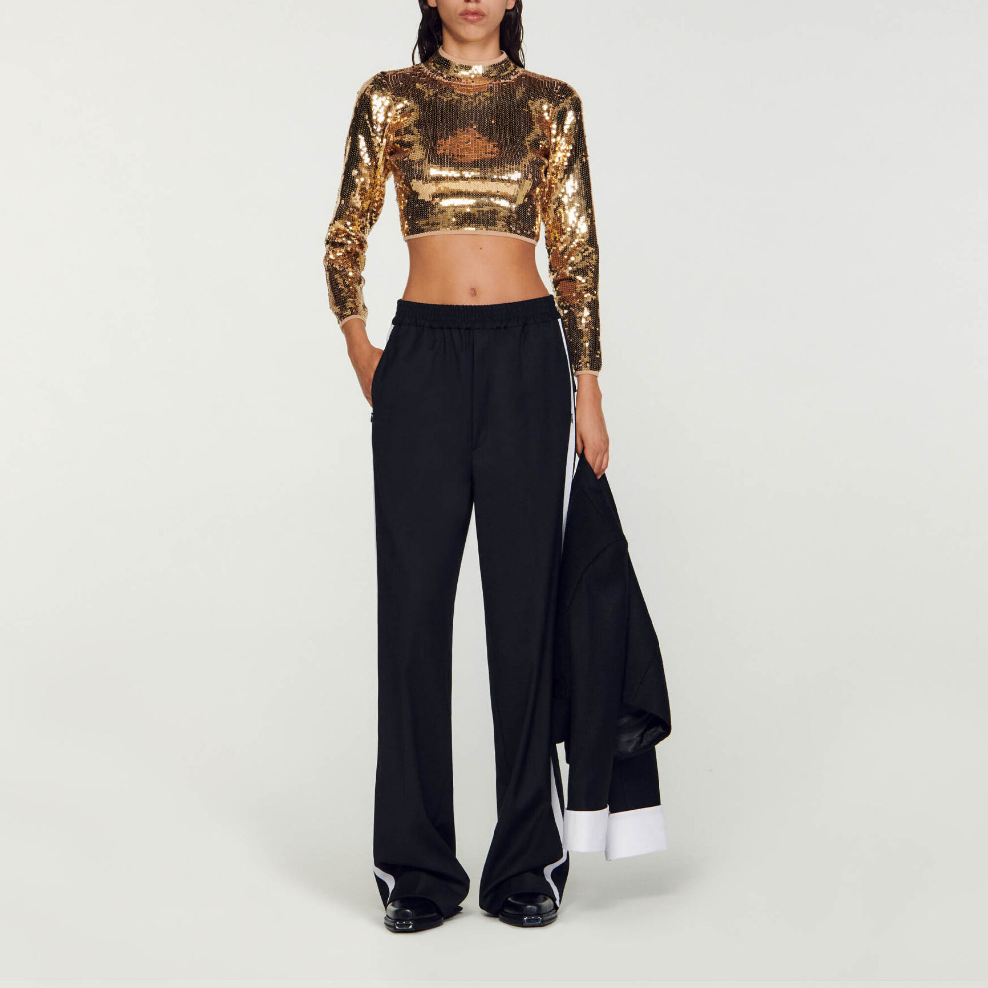 Korte tricot trui met lovertjes