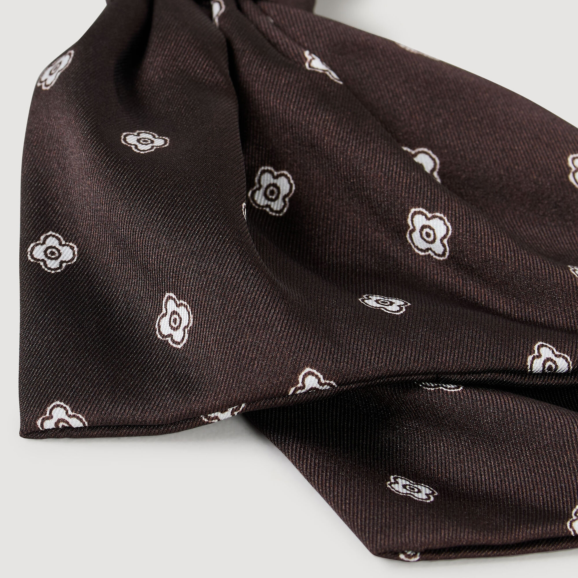 Gesatineerde strik barrette print