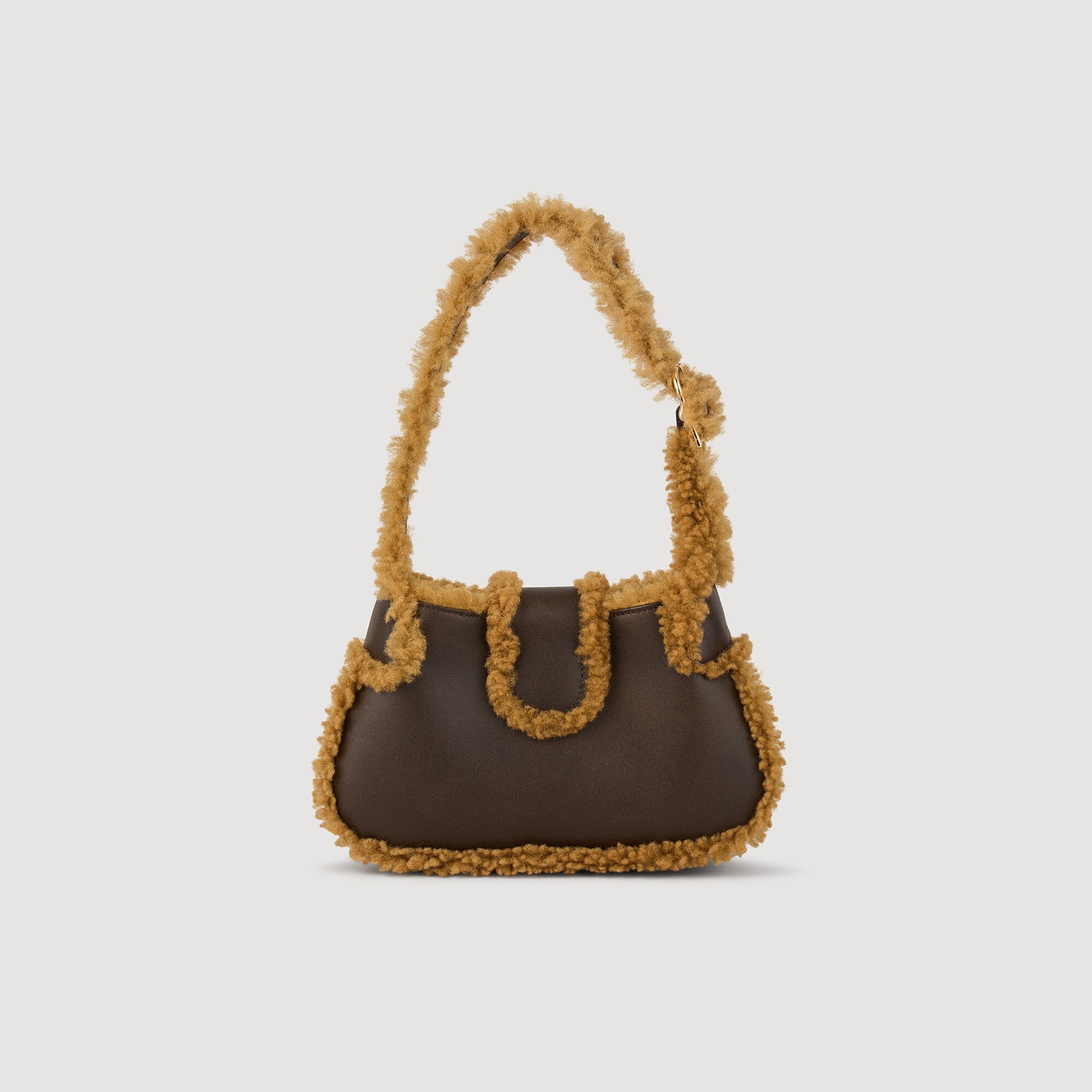 Tas Janet leer en wol