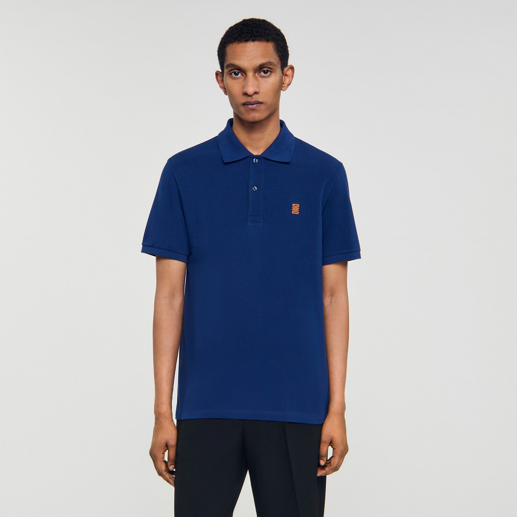 Poloshirt met leren logo