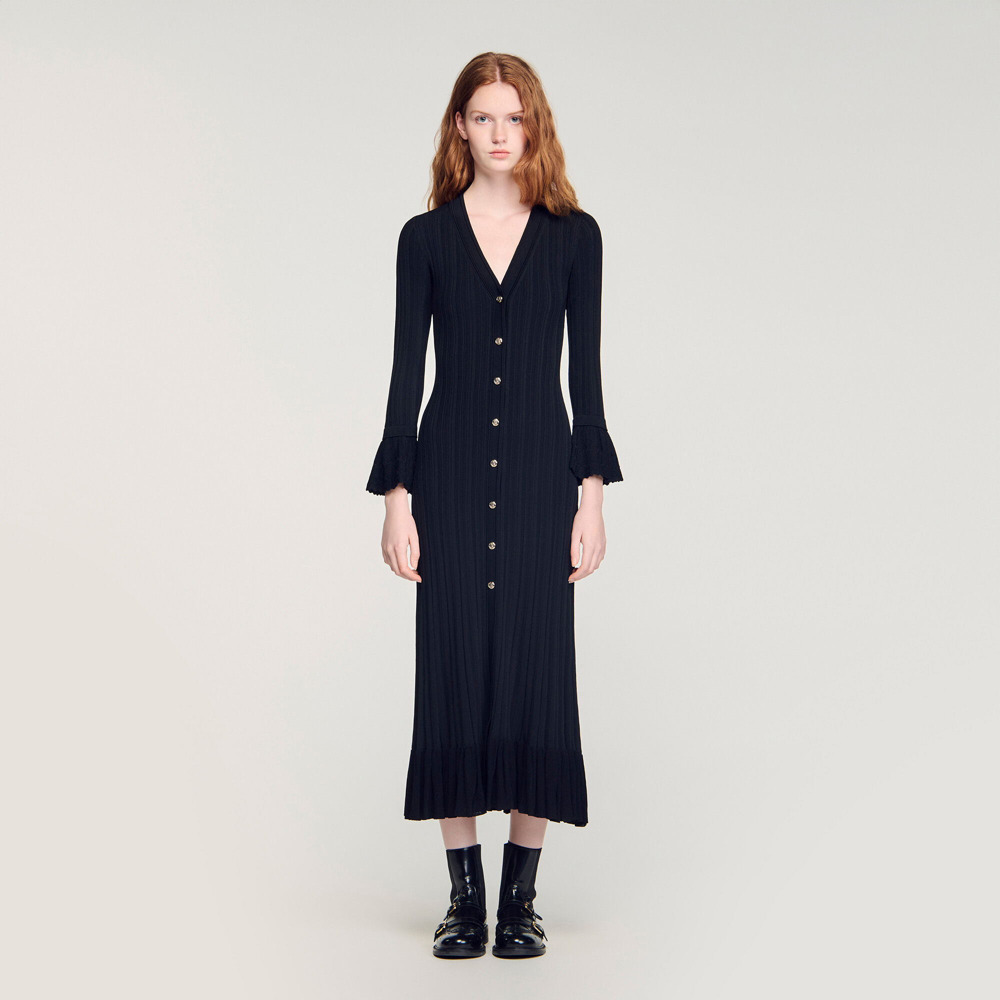 Lange gebreide jurk met volant