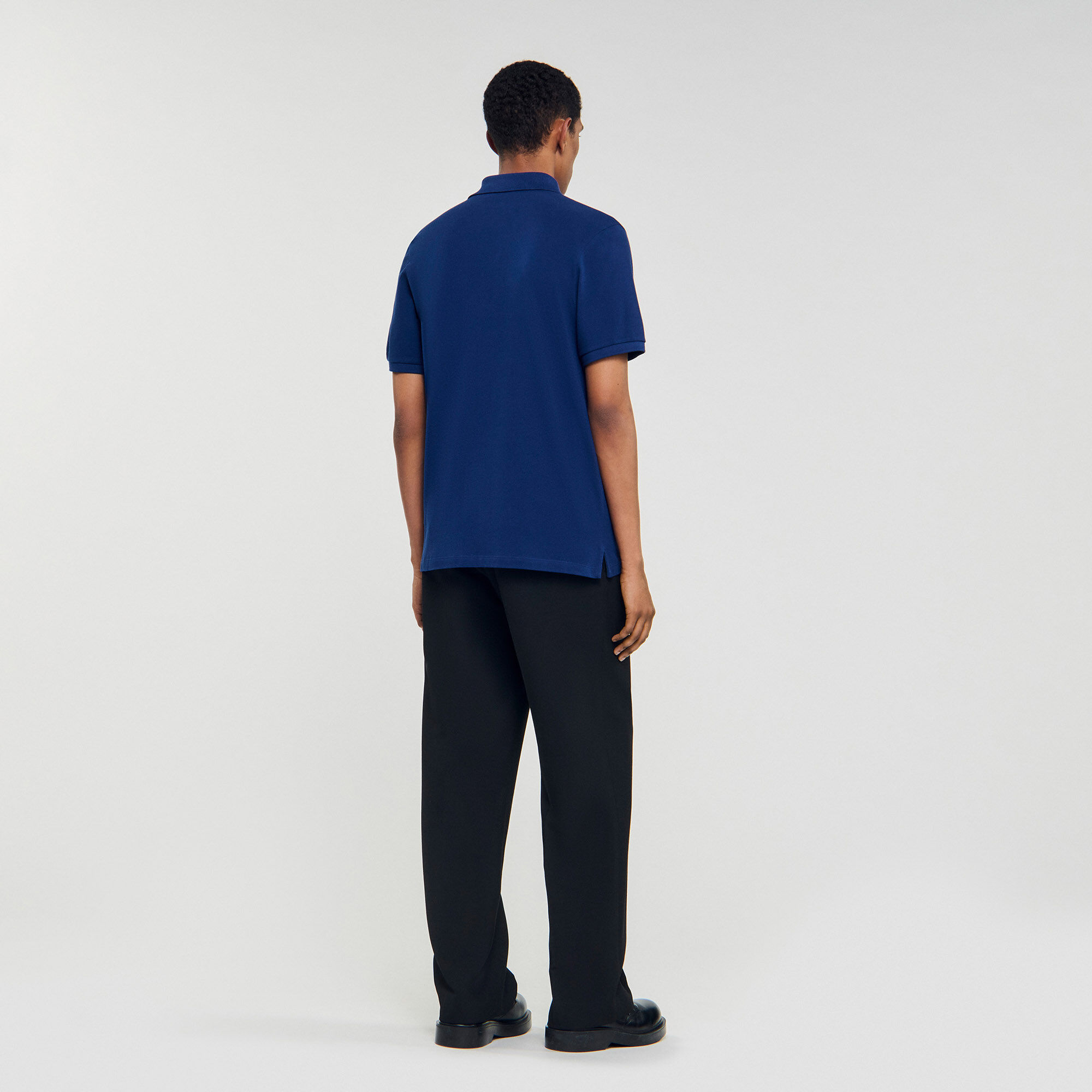 Poloshirt met leren logo