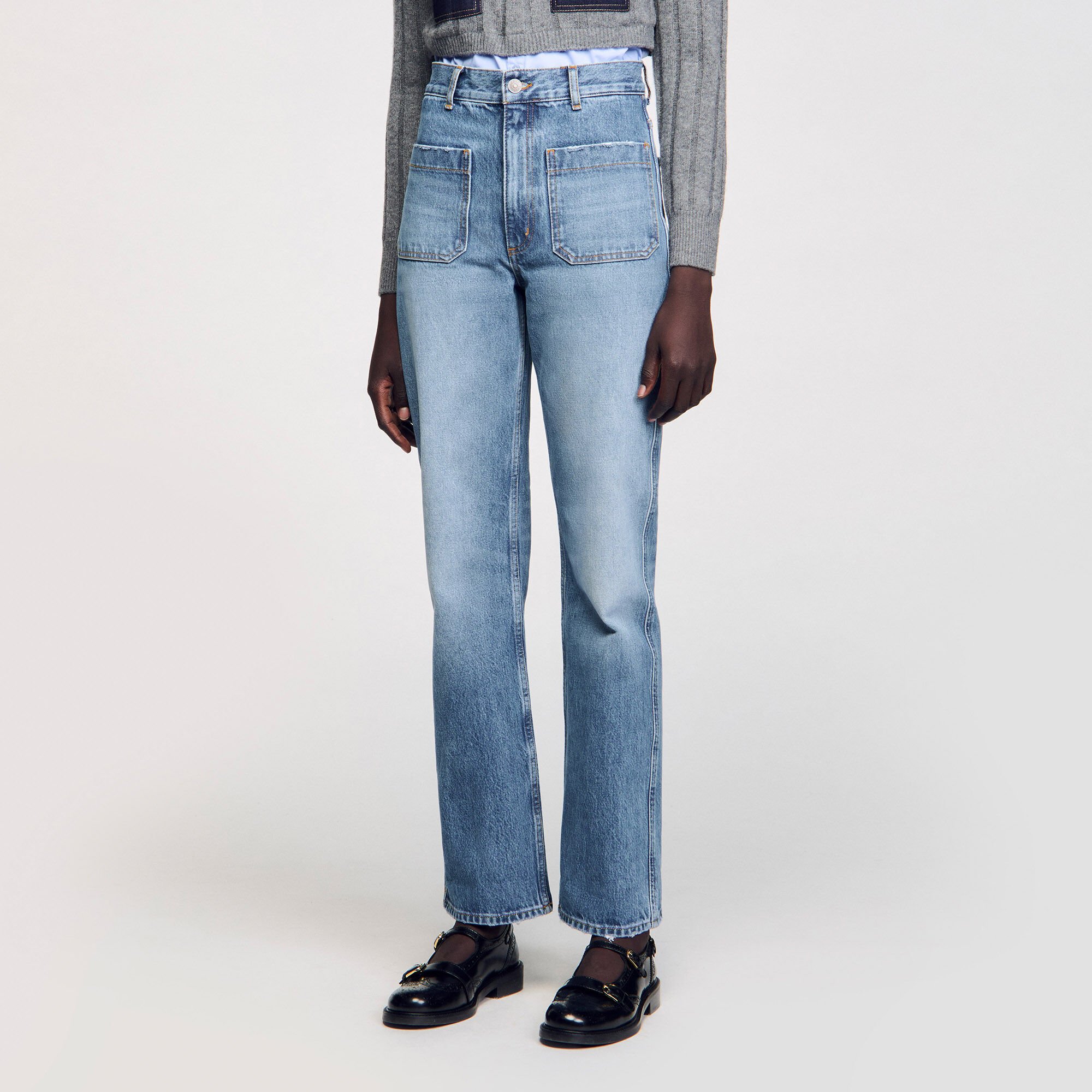 Verbleekte wijd uitlopende jeans
