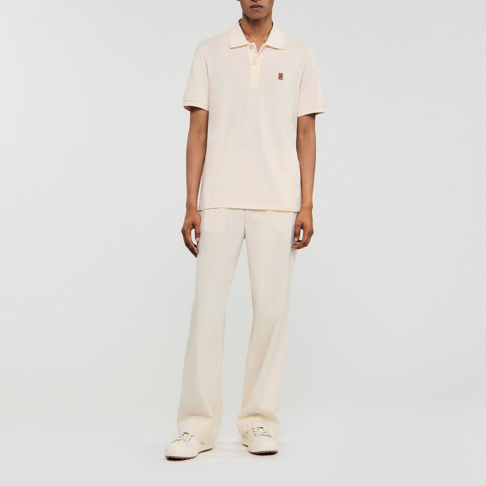 Poloshirt met leren logo - Man | Sandro