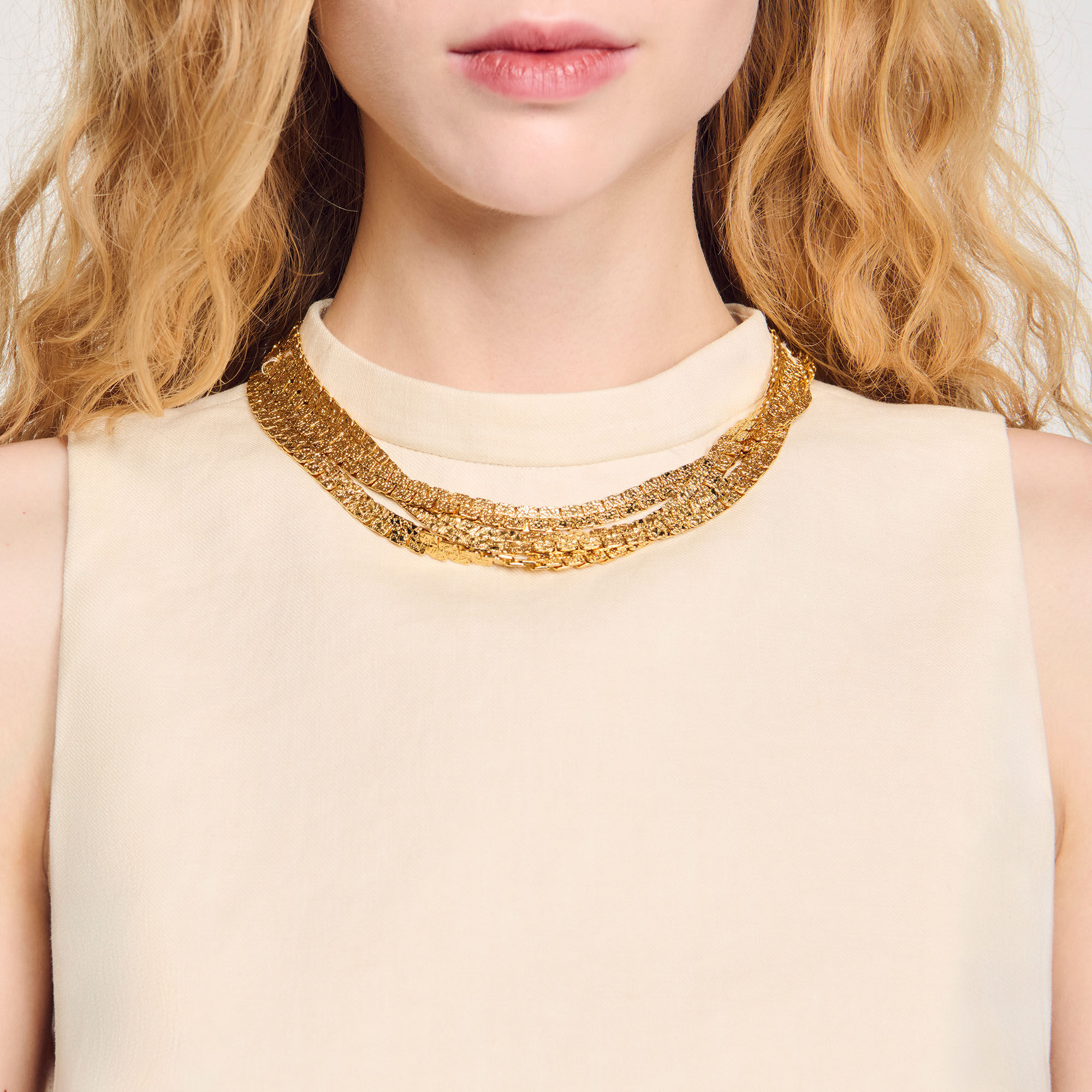 Korte top tricot met ketting