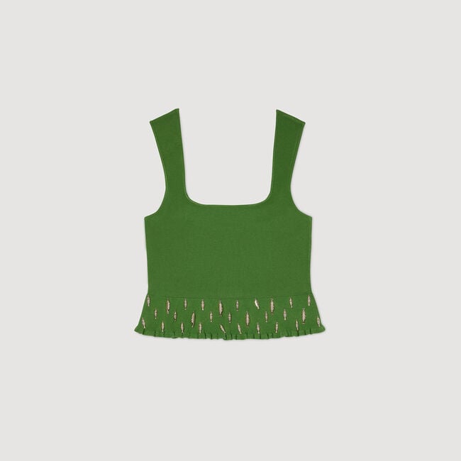 Top tricot met kwastjes