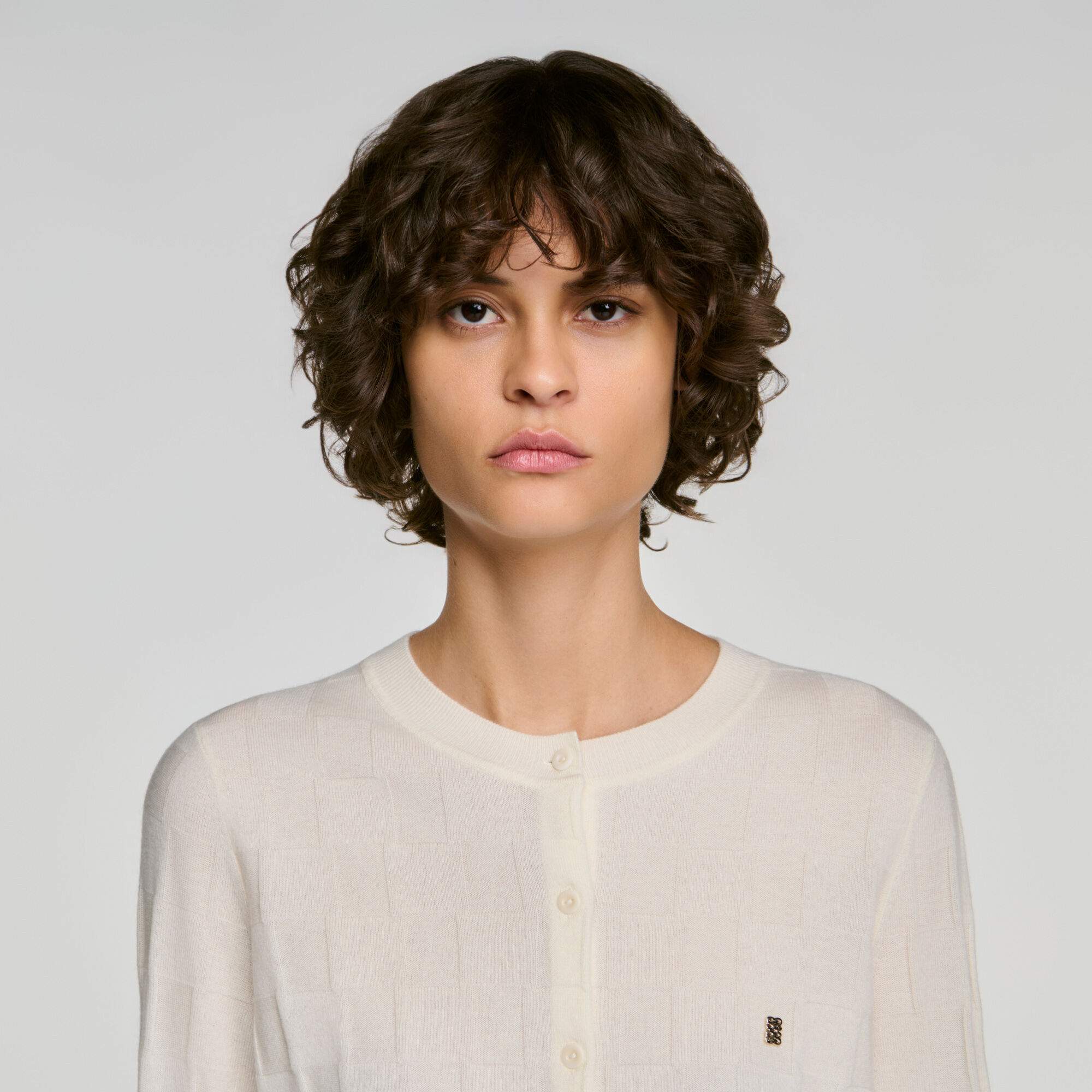 Kort vest met dambordsteek - Vrouw | Sandro