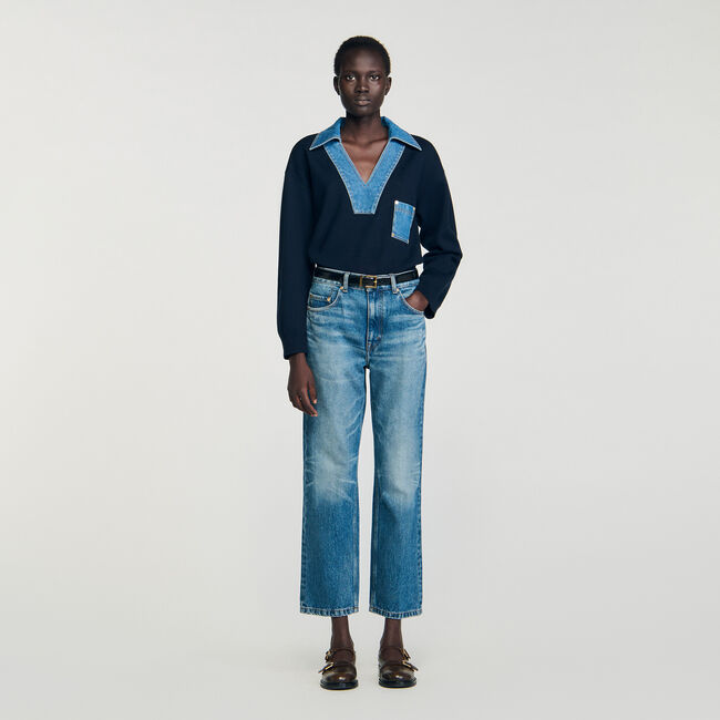 Trui met denimdetails