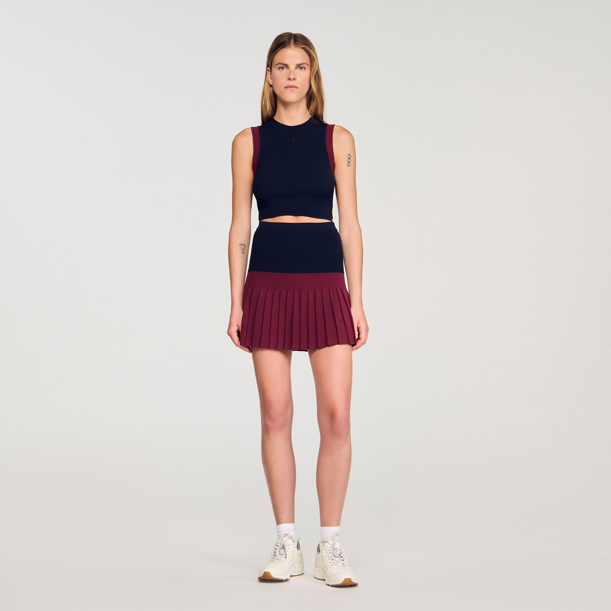 Korte geplooide bicolor rok