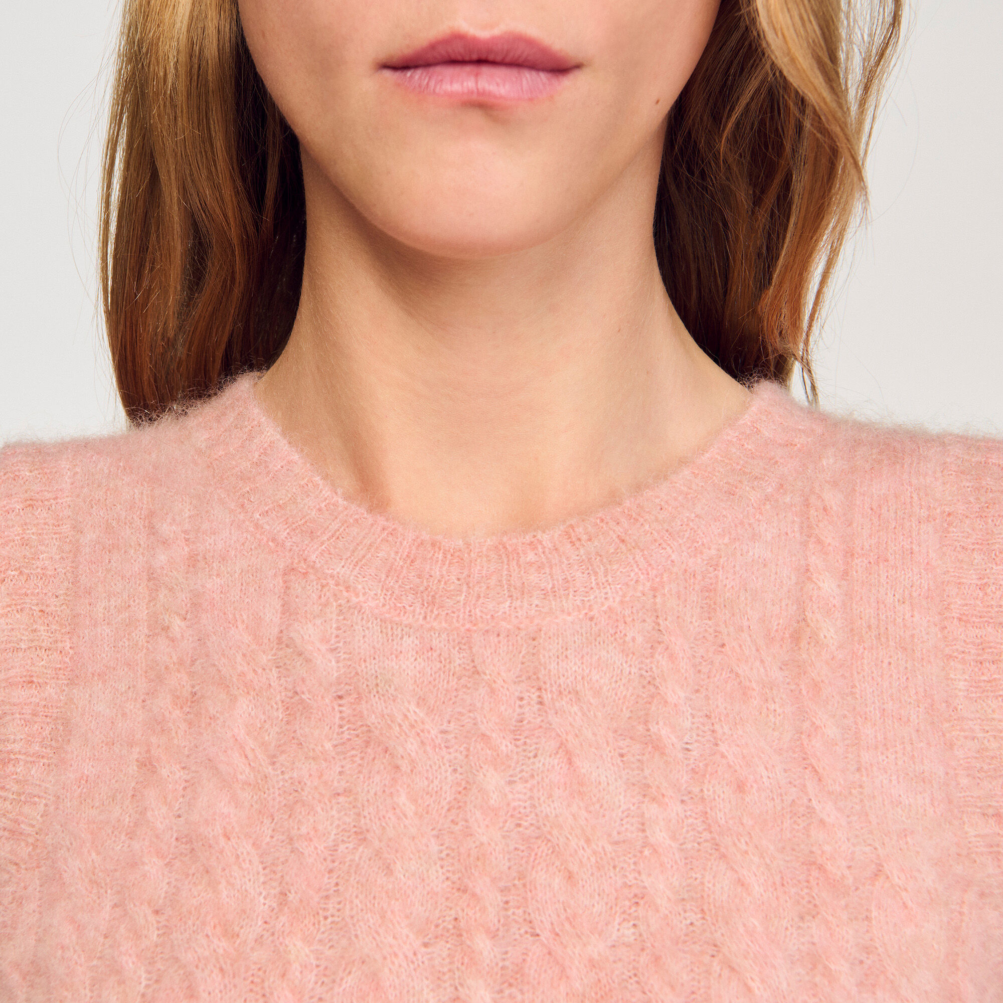 Mouwloze kabeltrui